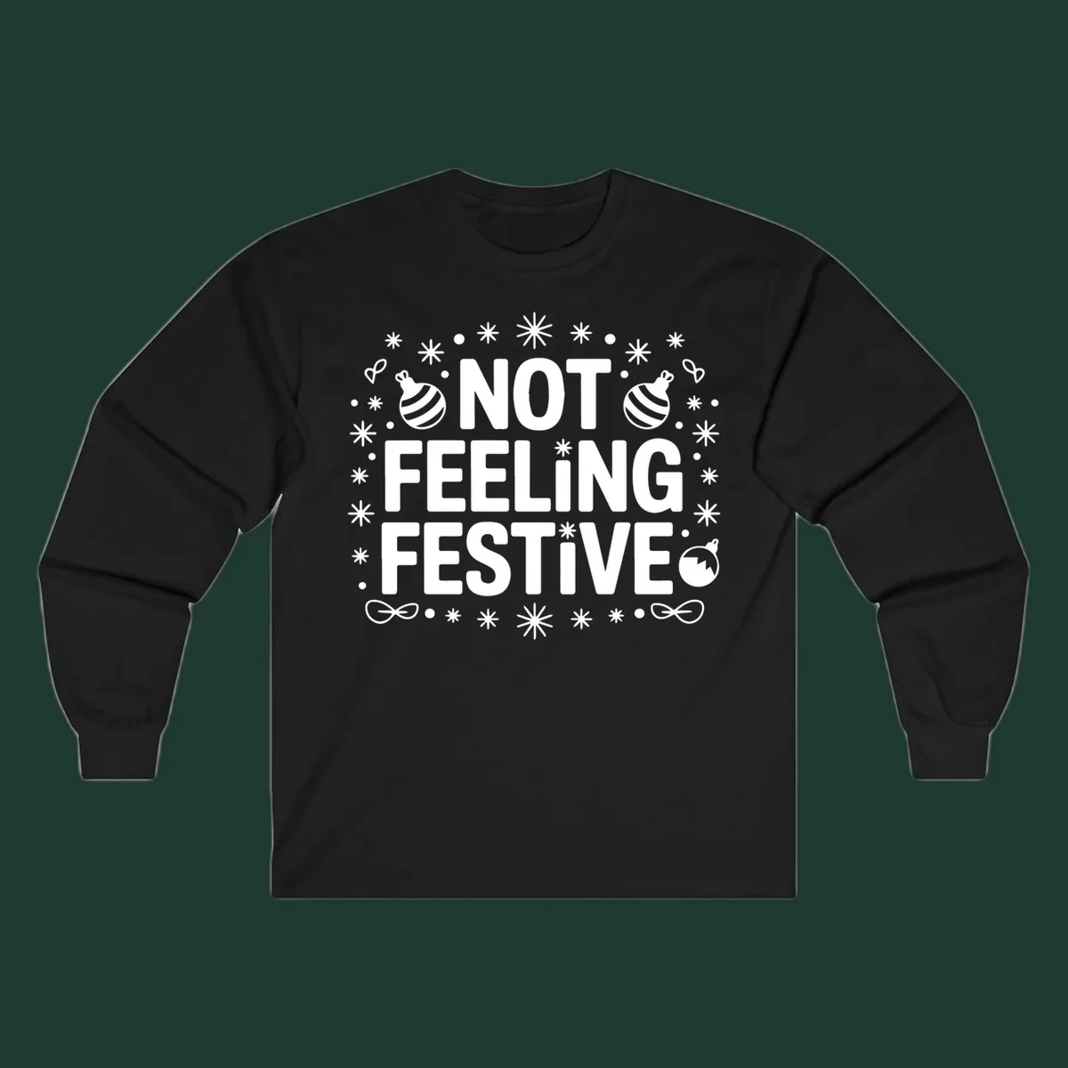 Not feeling festive graphic tee with text and winter elements.