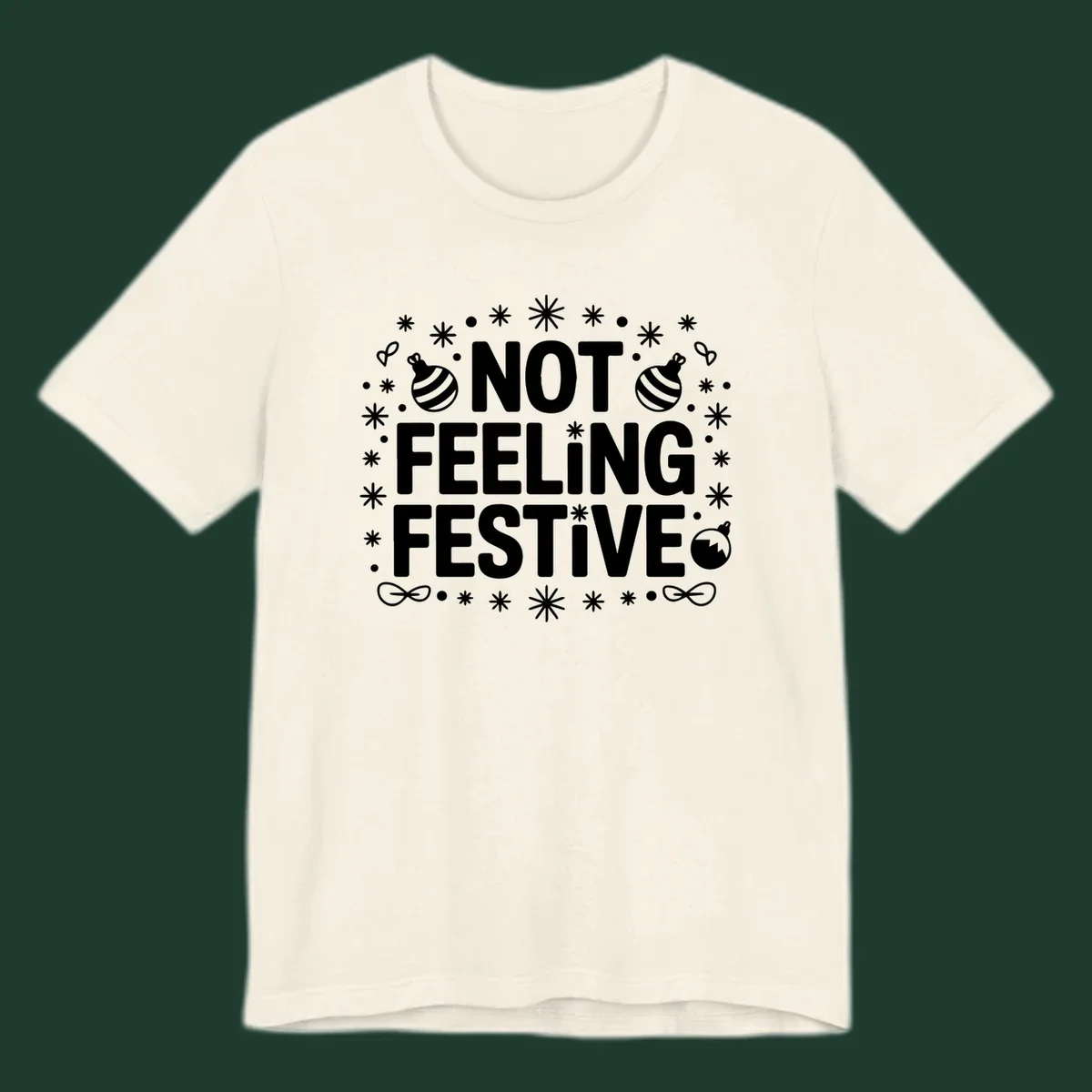 Not feeling festive graphic tee with text and winter elements.