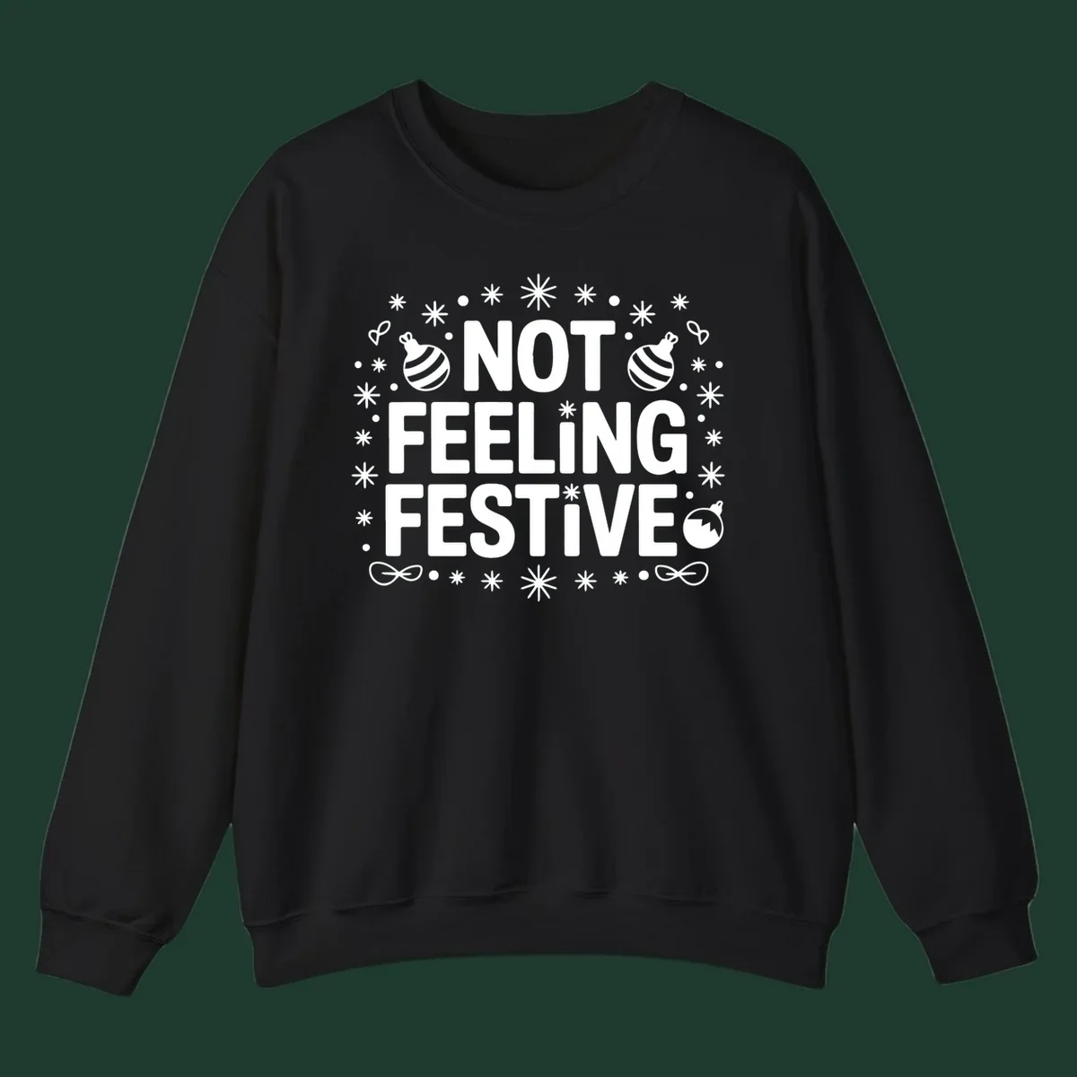 Not feeling festive graphic tee with text and winter elements.
