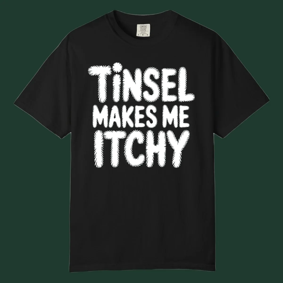Tinsel Makes Me Itchy typography design in white on black, and black on white.