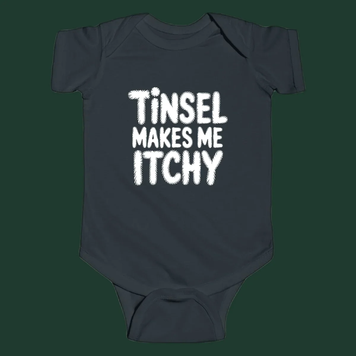 Tinsel Makes Me Itchy typography design in white on black, and black on white.
