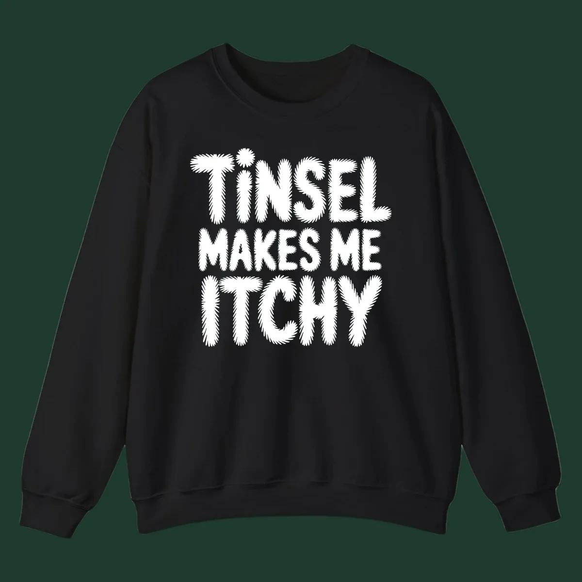 Tinsel Makes Me Itchy typography design in white on black, and black on white.