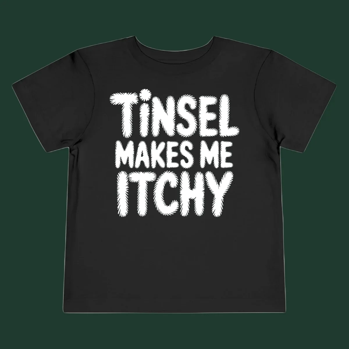 Tinsel Makes Me Itchy typography design in white on black, and black on white.