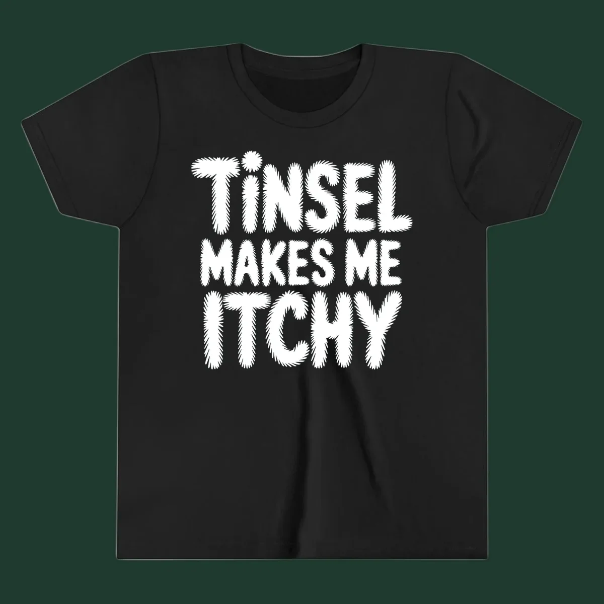 Tinsel Makes Me Itchy typography design in white on black, and black on white.