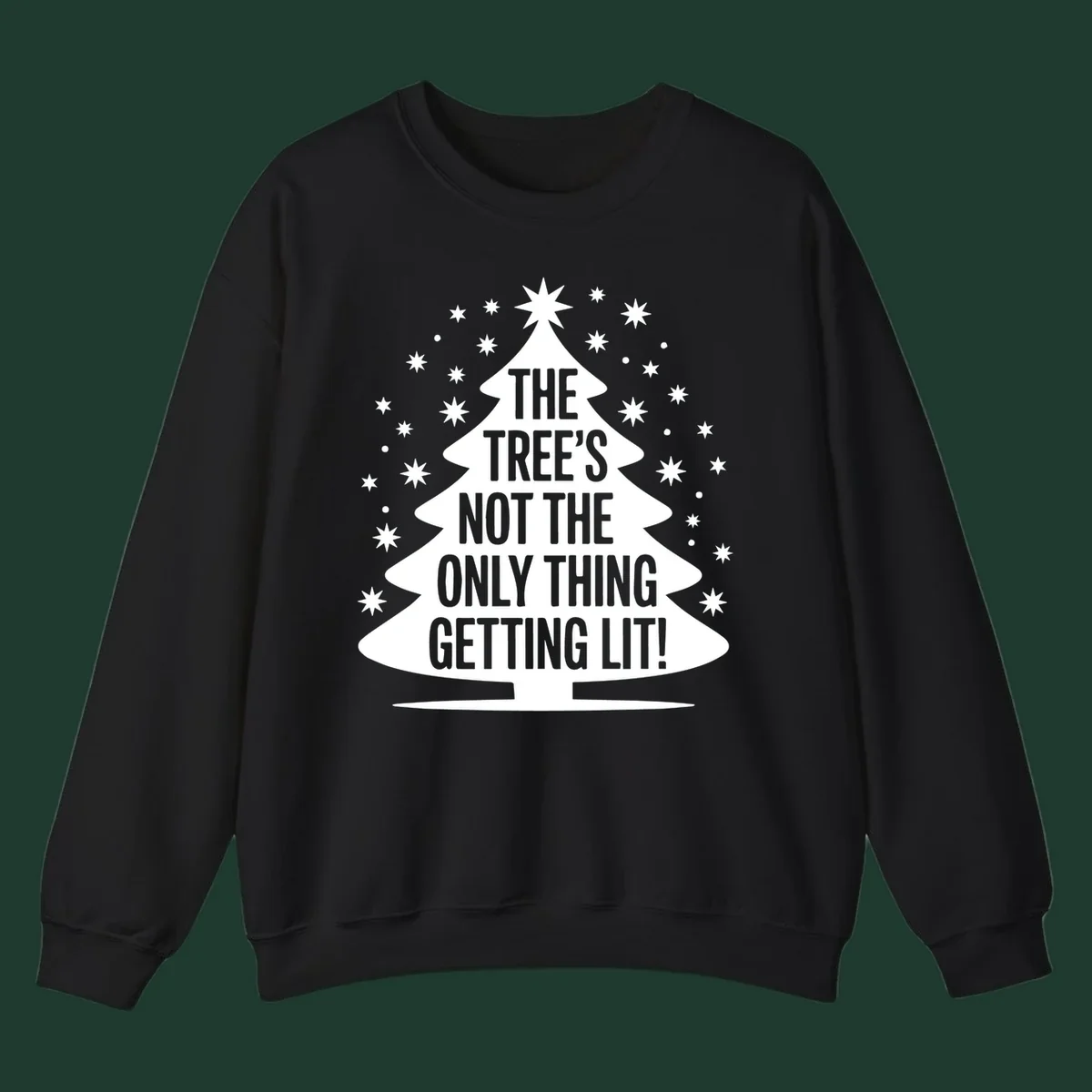 Christmas tree silhouette with text "THE TREE'S NOT THE ONLY THING GETTING LIT!" and surrounding stars.