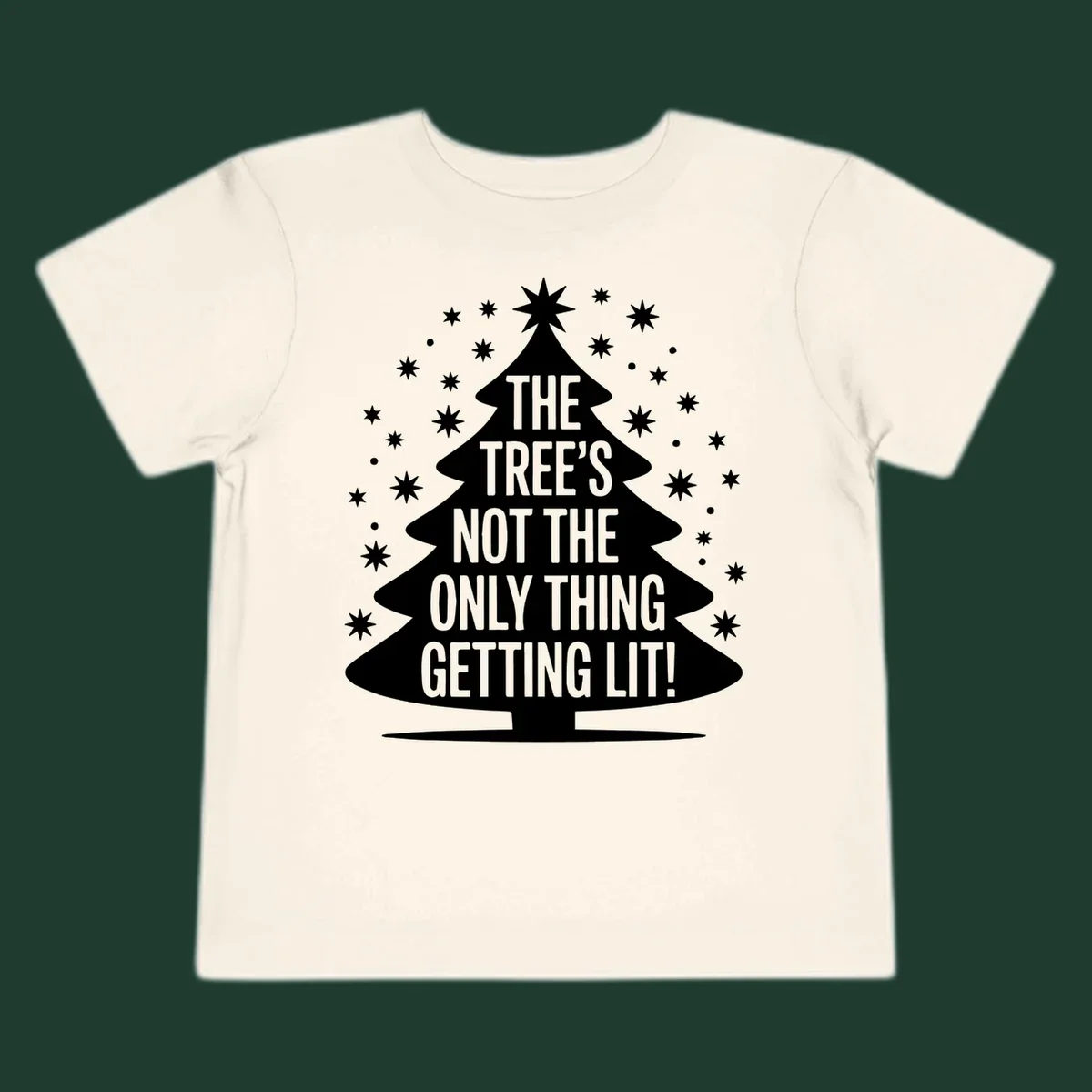 Christmas tree silhouette with text "THE TREE'S NOT THE ONLY THING GETTING LIT!" and surrounding stars.