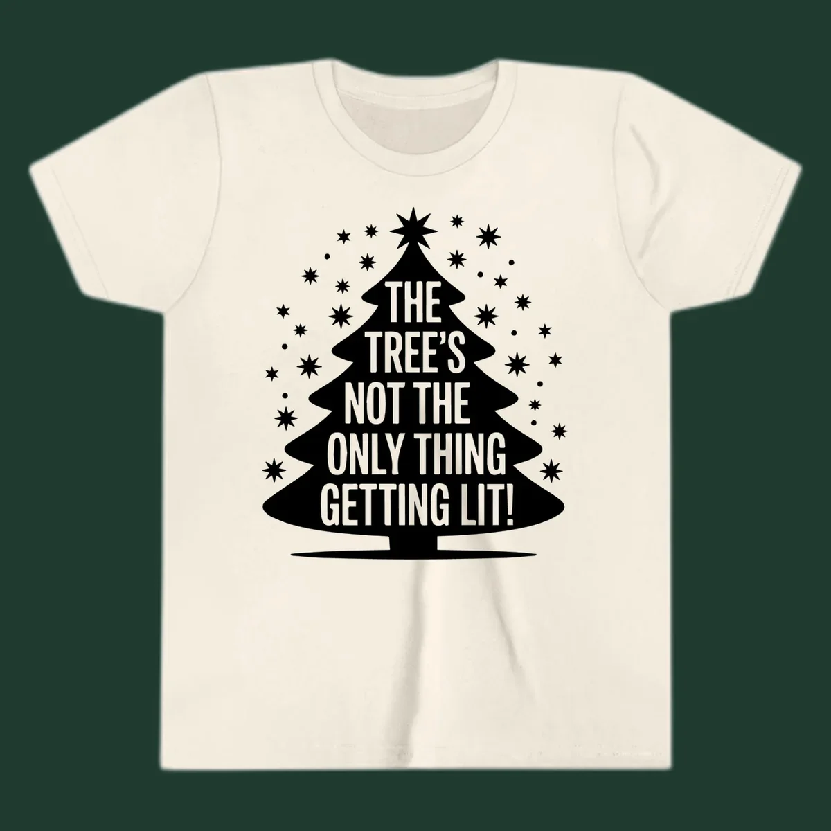 Christmas tree silhouette with text "THE TREE'S NOT THE ONLY THING GETTING LIT!" and surrounding stars.