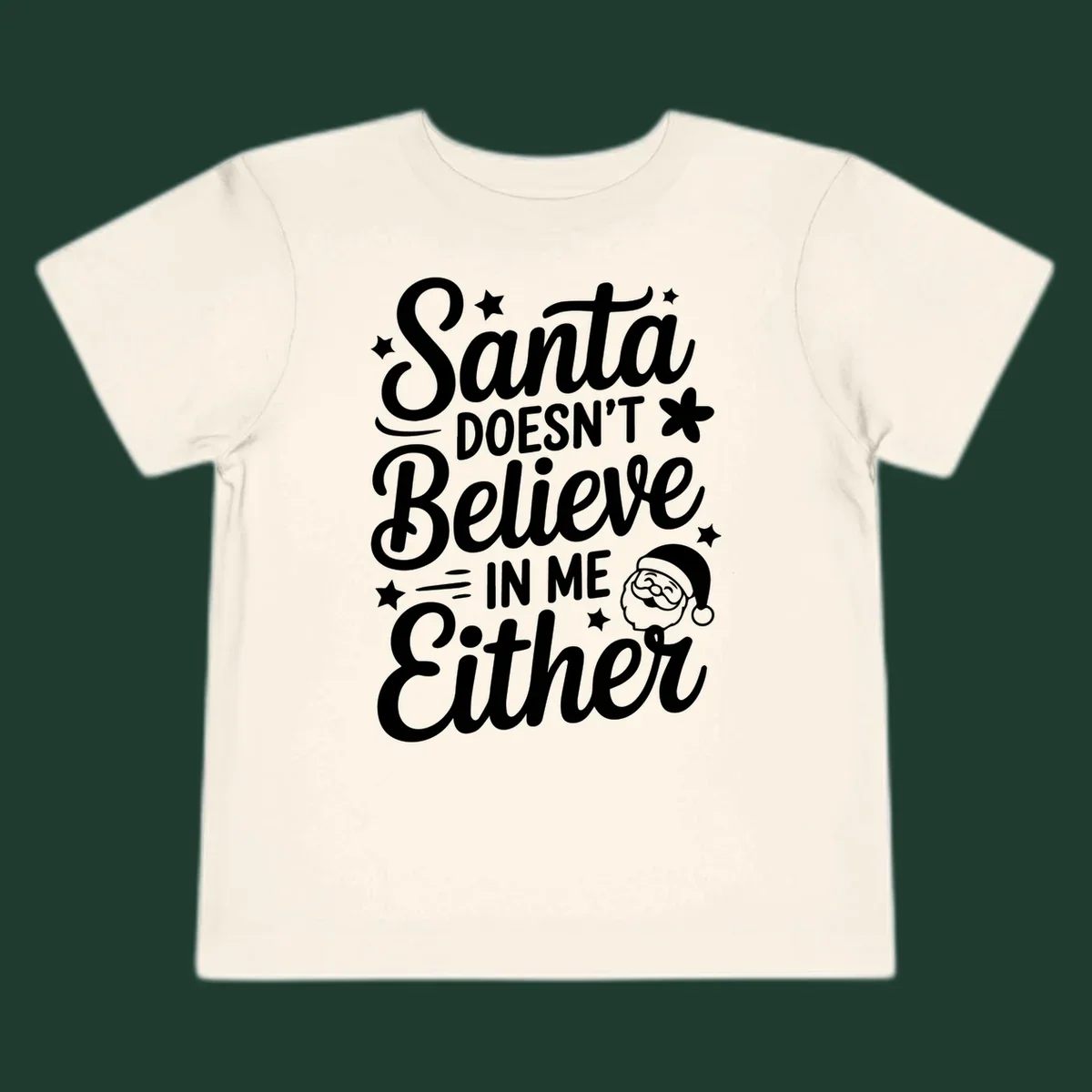 Santa doesn't believe in me either text with Santa illustration and stars.