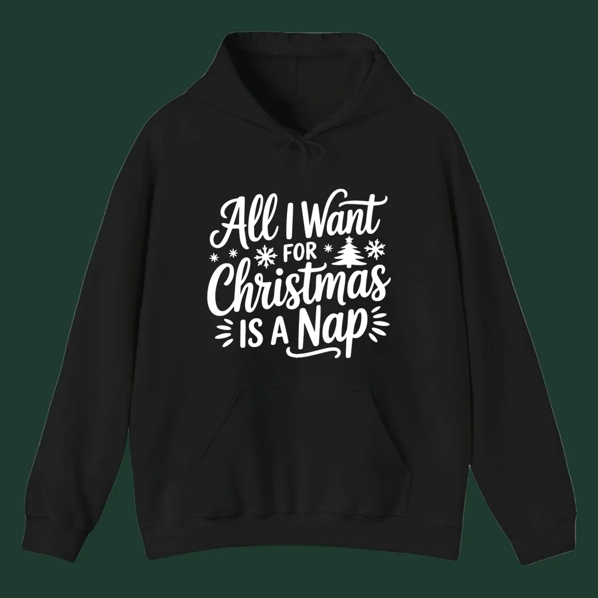 All I Want For Christmas Is A Nap typographic design with snowflakes and a Christmas tree.
