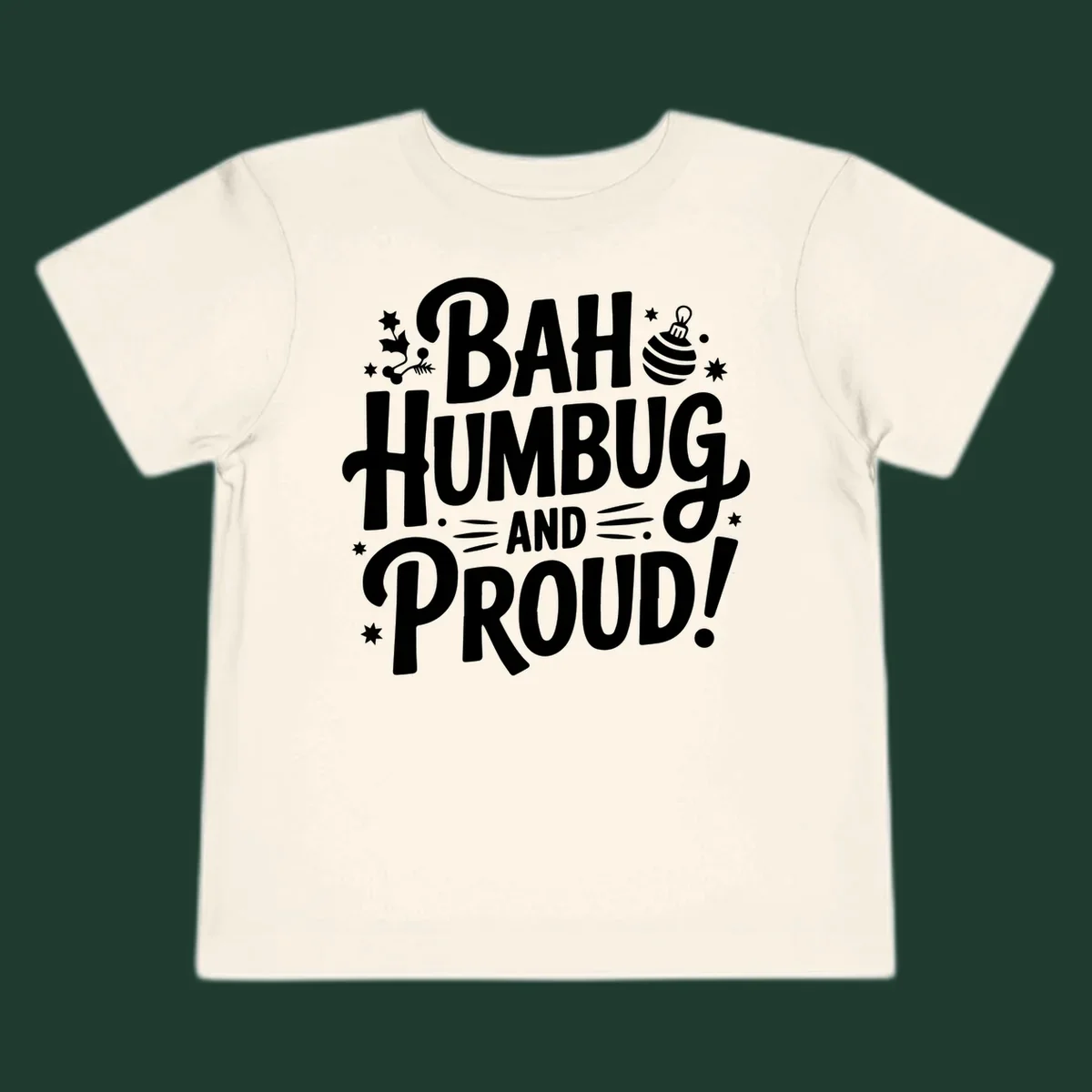 Bah Humbug And Proud typography design with holly and stars.