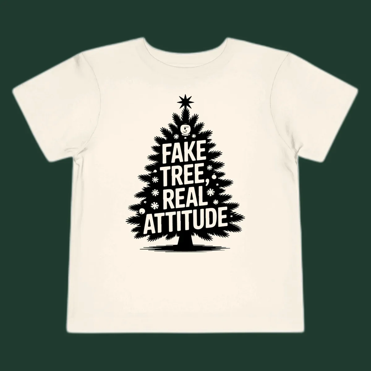 Fake tree, real attitude Christmas graphic with a stylized tree and bold text.