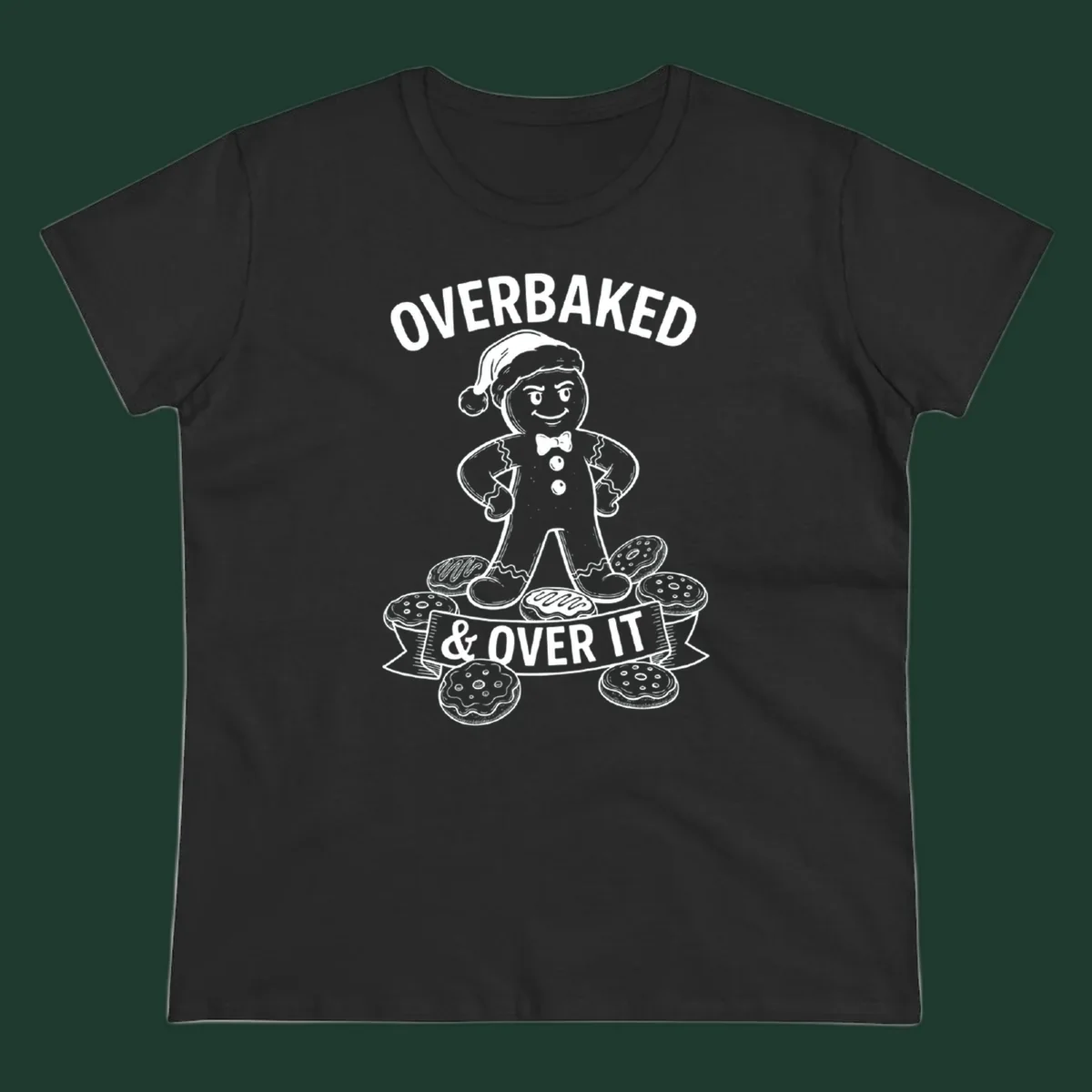 Overbaked gingerbread man with Santa hat and cookies, text says OVERBAKED & OVER IT.