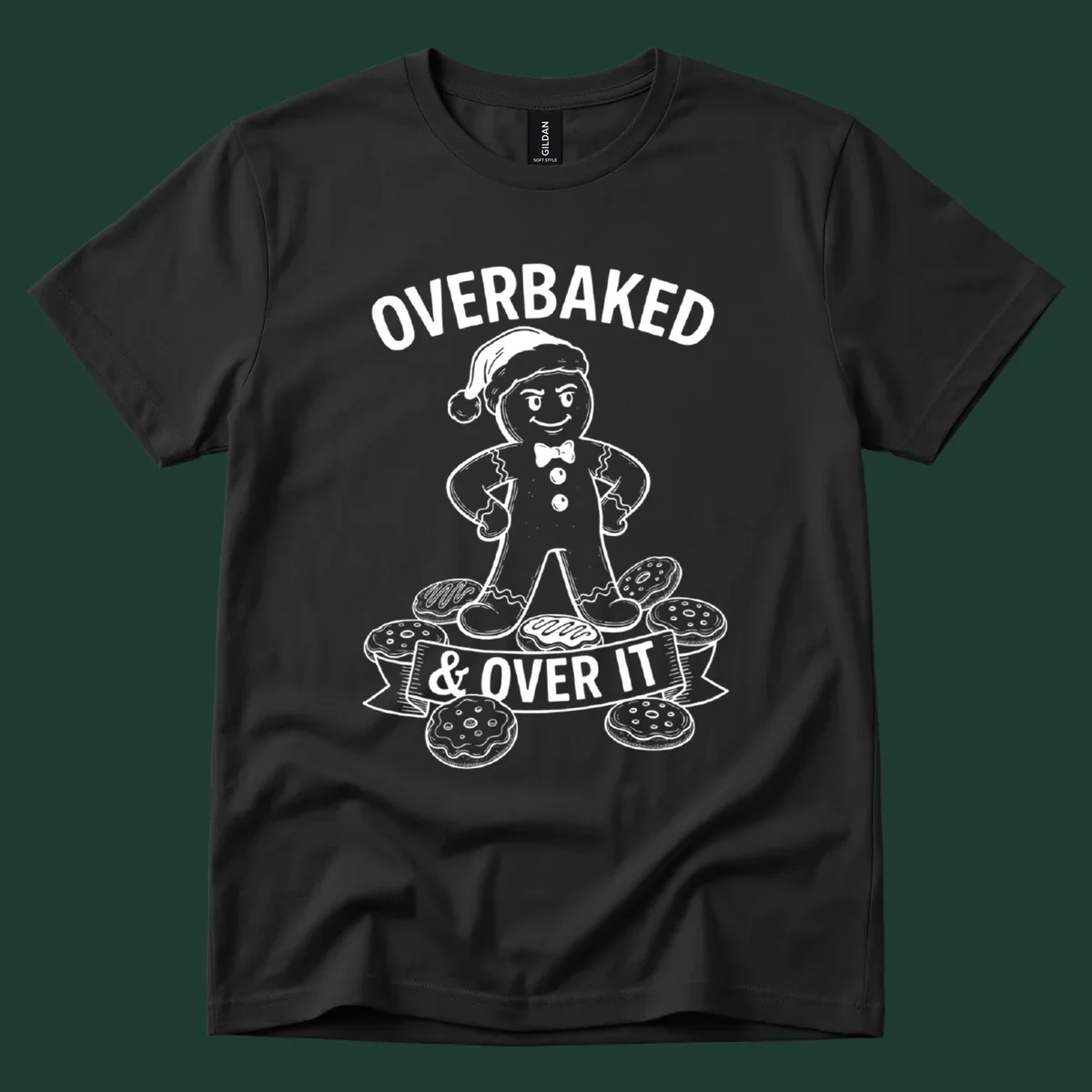 Overbaked gingerbread man with Santa hat and cookies, text says OVERBAKED & OVER IT.