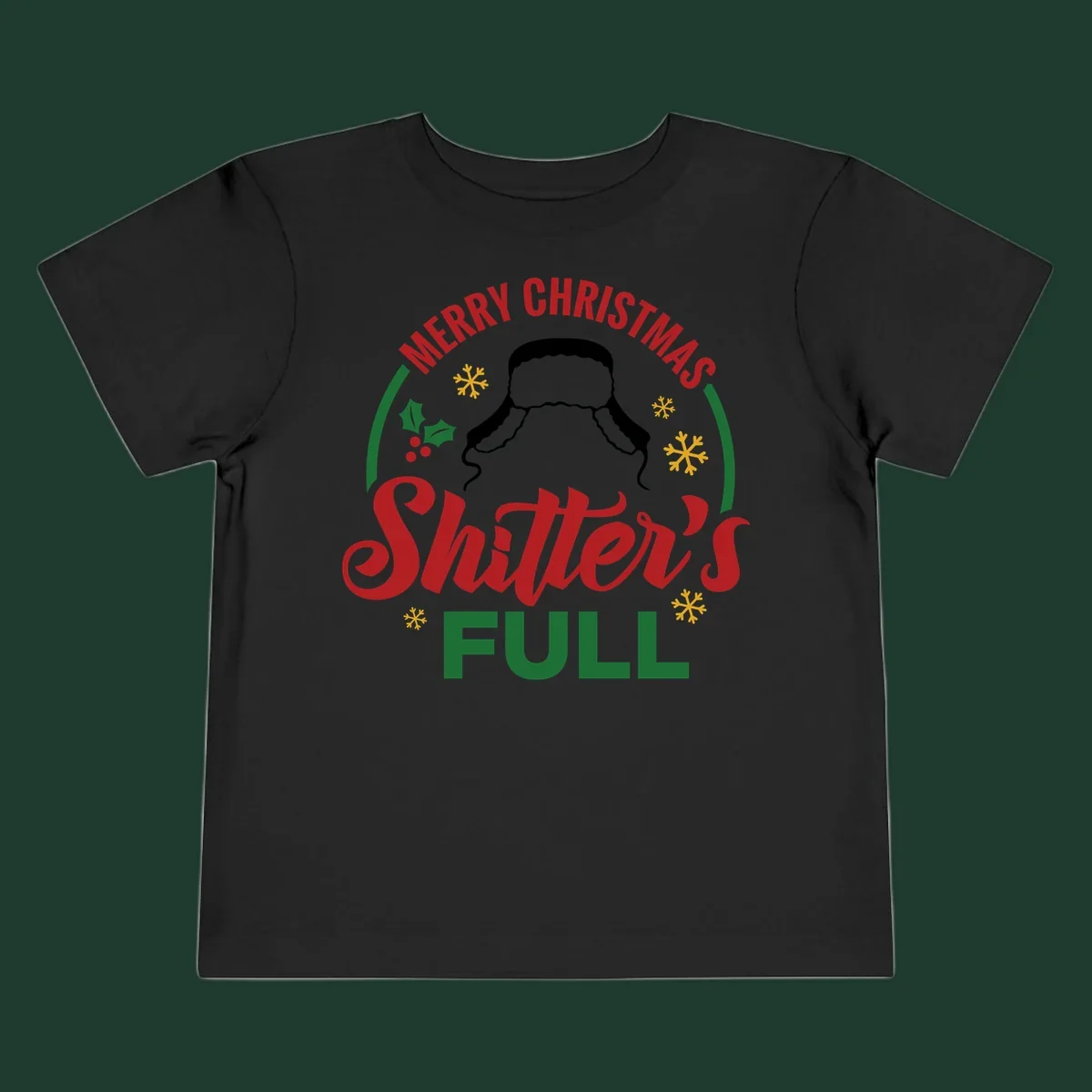 Christmas Shitter's Full graphic with text, hat silhouette, holly, and snowflakes.