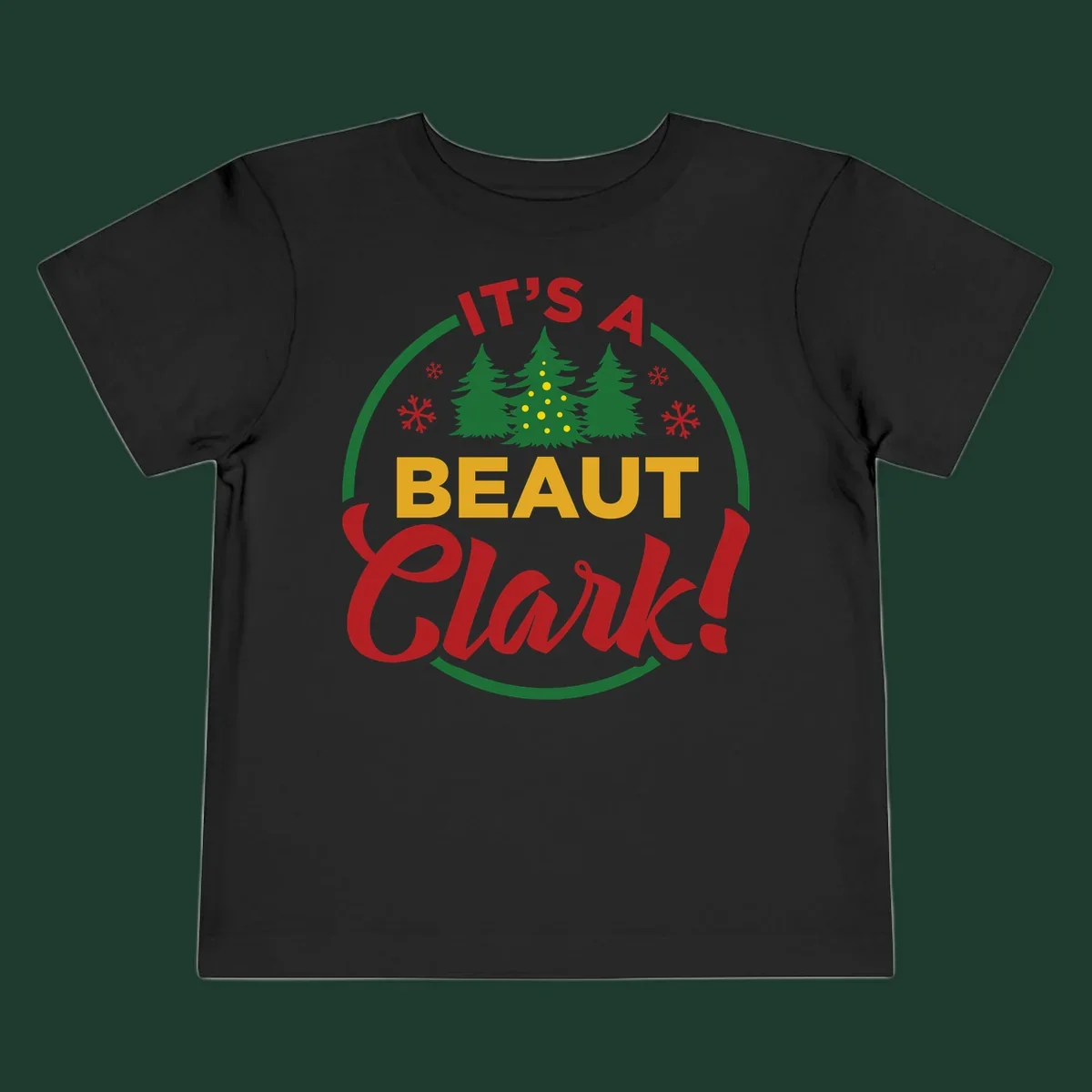 Its A Beaut Clark Christmas design with text and holiday illustrations.