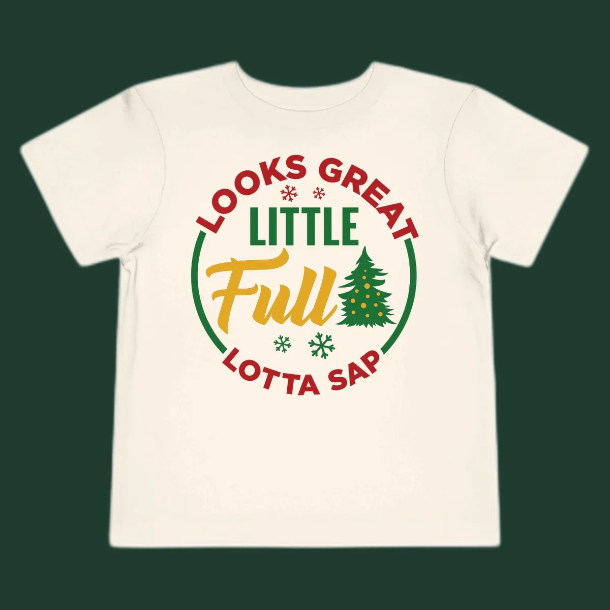 Circular text reads "Looks Great Little Full Lotta Sap" with a Christmas tree and snowflakes.