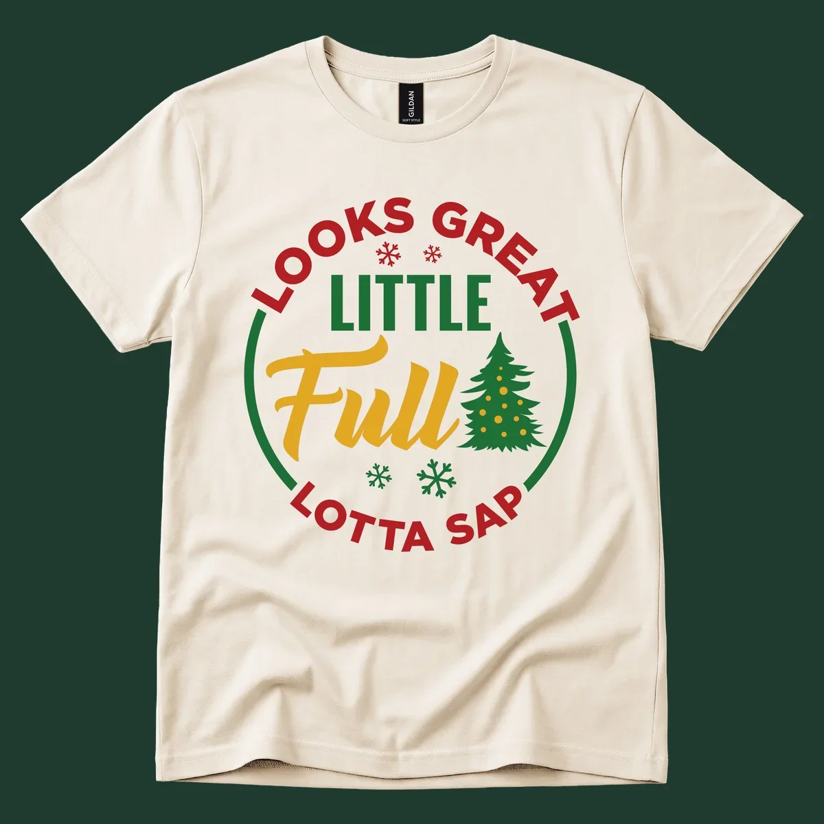 Circular text reads "Looks Great Little Full Lotta Sap" with a Christmas tree and snowflakes.