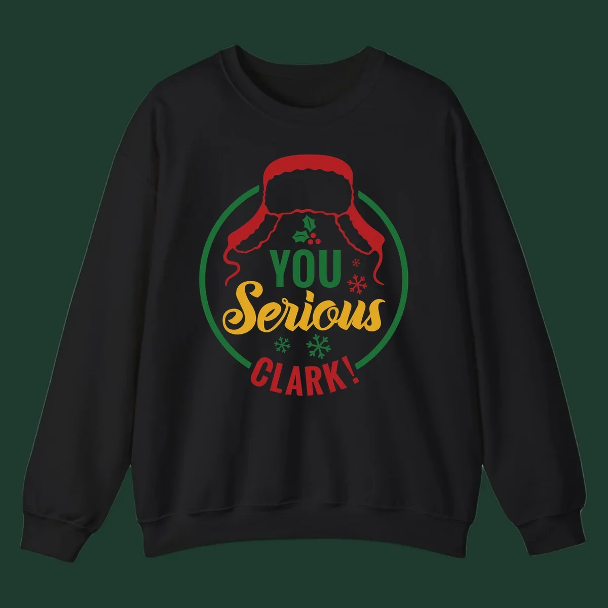 Christmas Clark quote graphic with a hat, holly, and snowflakes.
