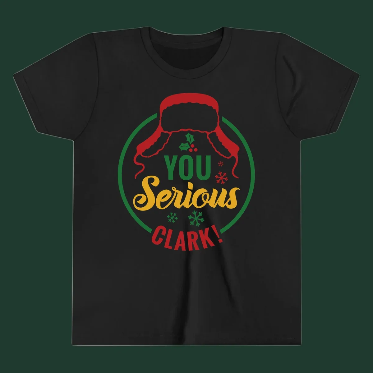 Christmas Clark quote graphic with a hat, holly, and snowflakes.