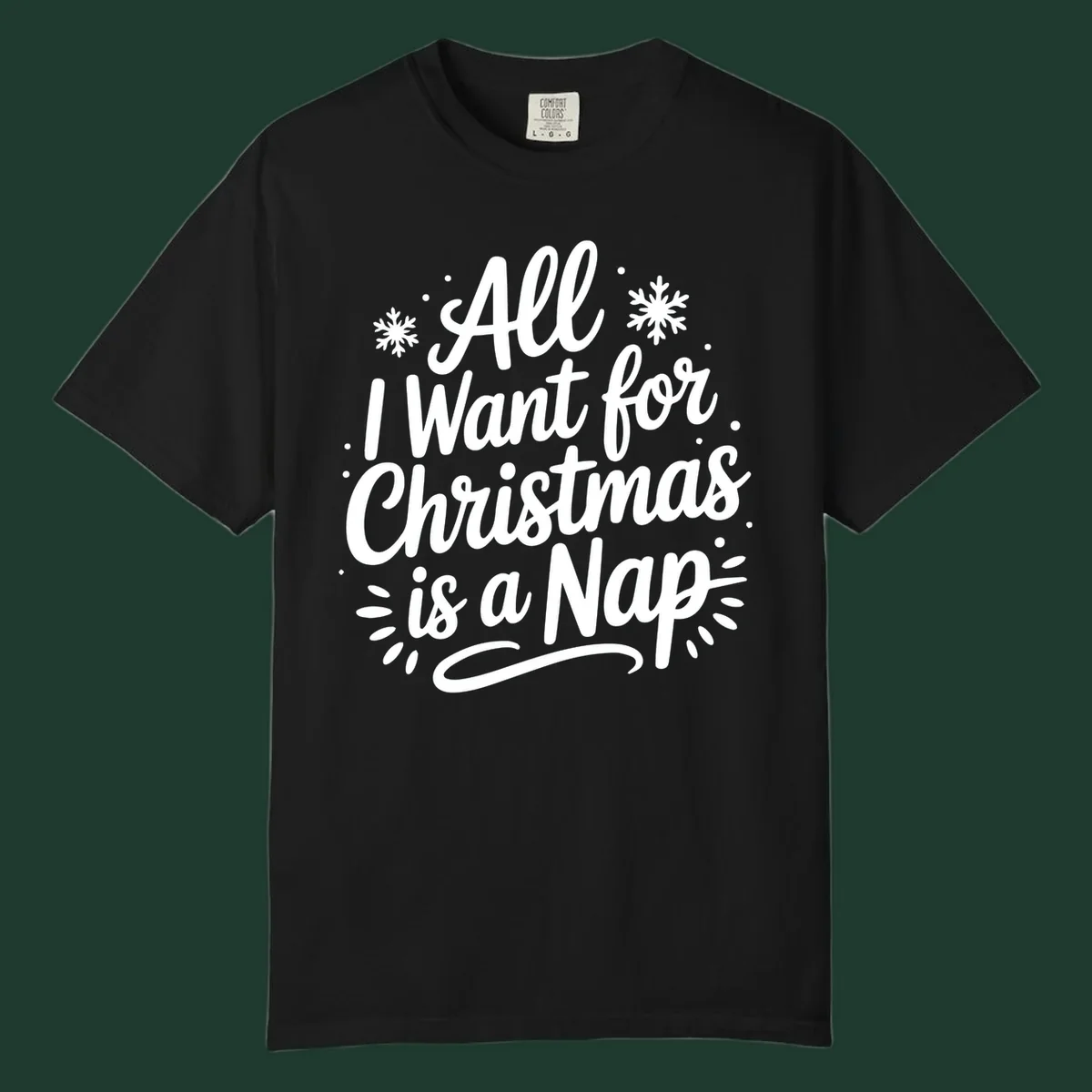 All I Want for Christmas Is A Nap typography design with snowflakes.