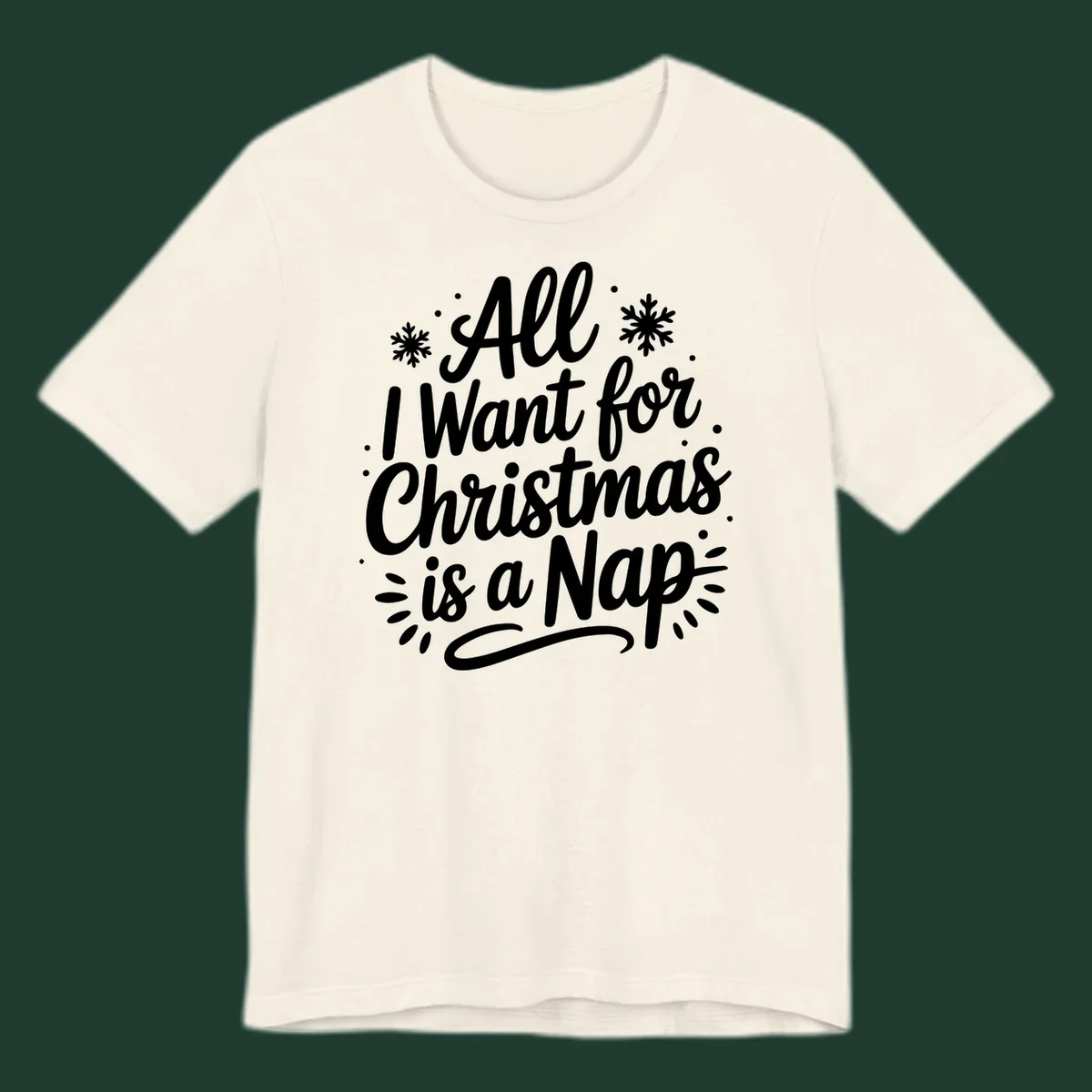 All I Want for Christmas Is A Nap typography design with snowflakes.