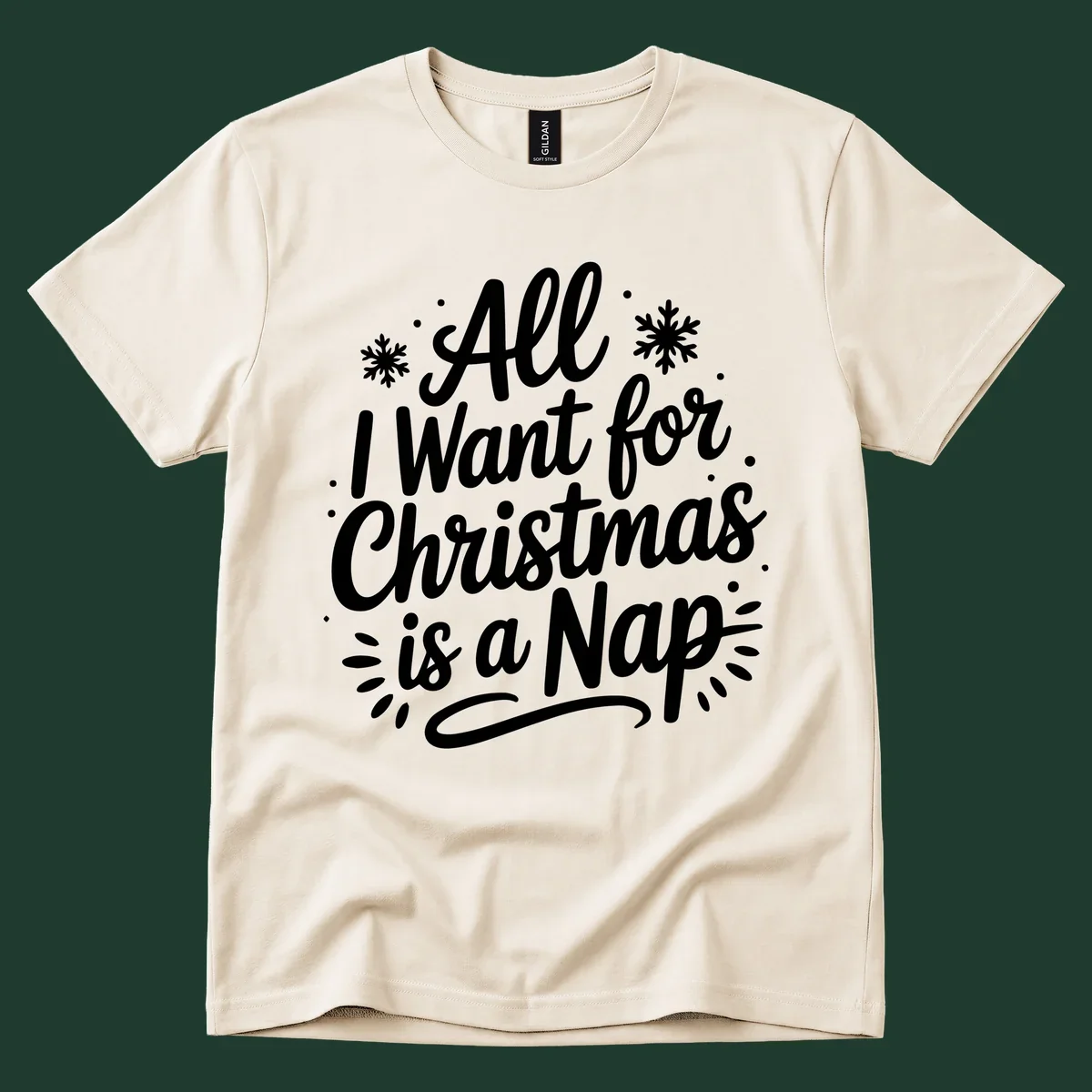 All I Want for Christmas Is A Nap typography design with snowflakes.