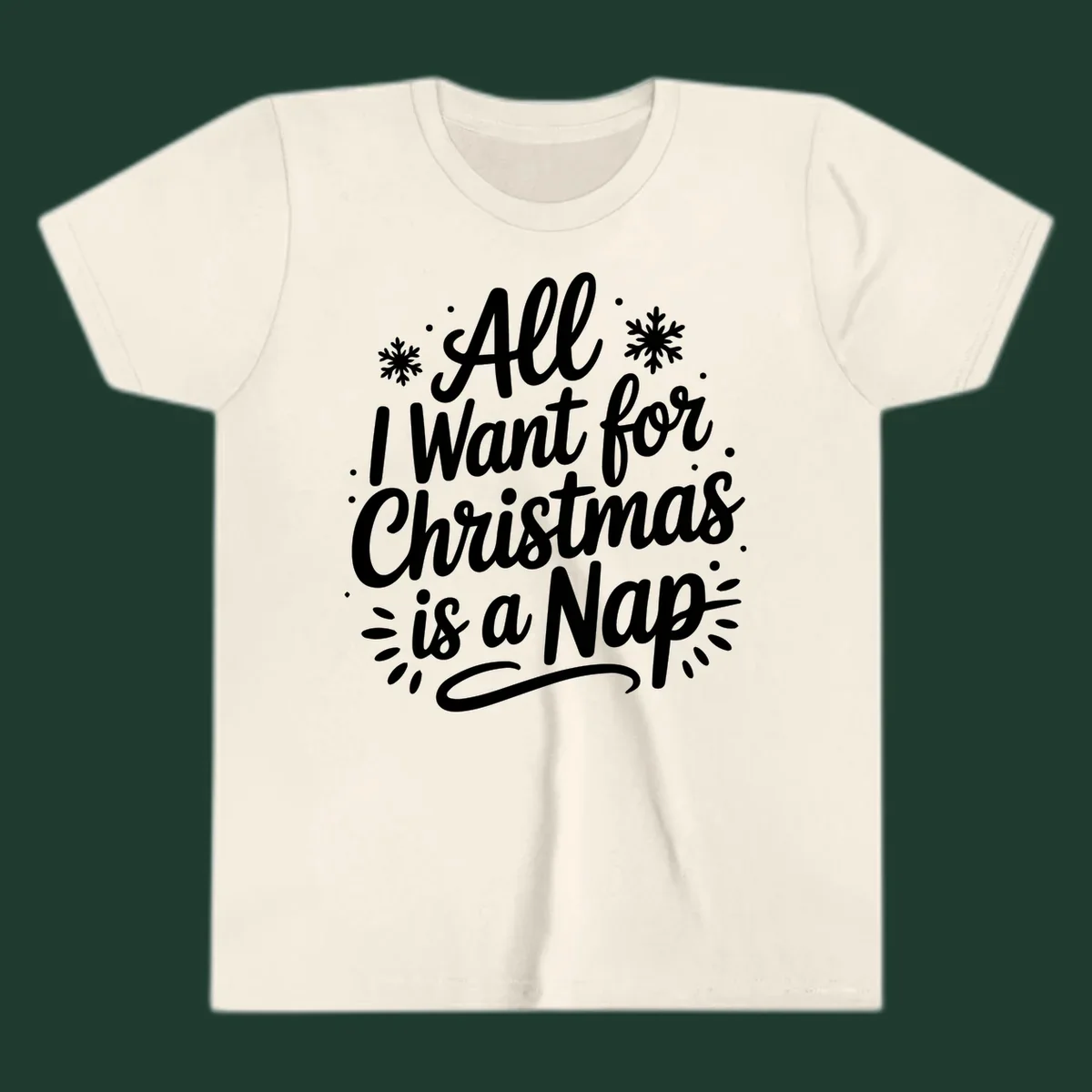 All I Want for Christmas Is A Nap typography design with snowflakes.