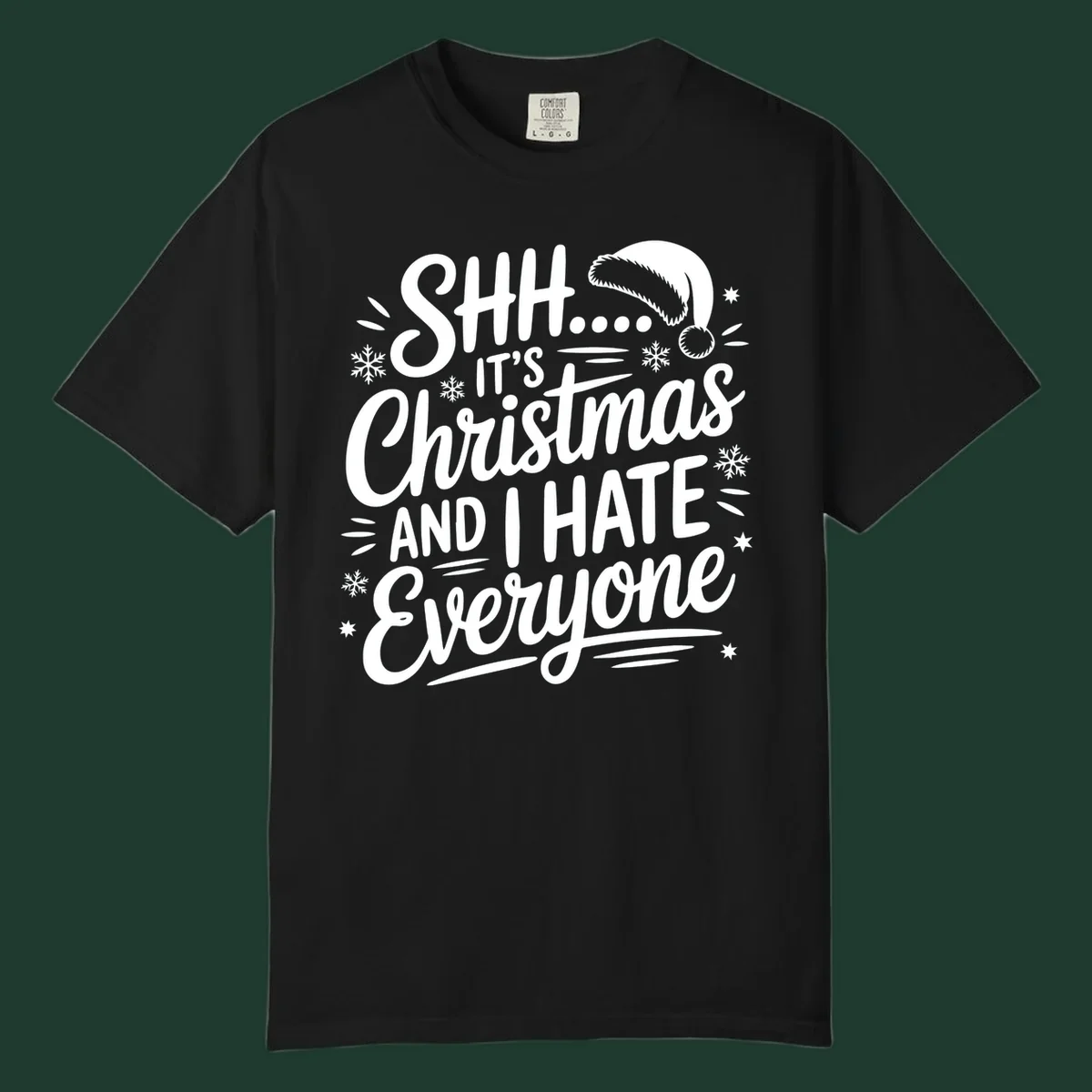 Shh it's Christmas And I Hate Everyone typography with Santa hat, snowflakes, and stars.