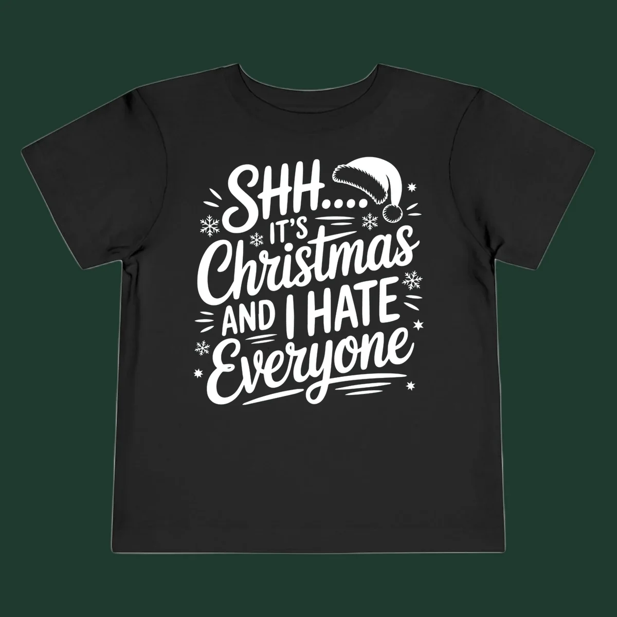 Shh it's Christmas And I Hate Everyone typography with Santa hat, snowflakes, and stars.