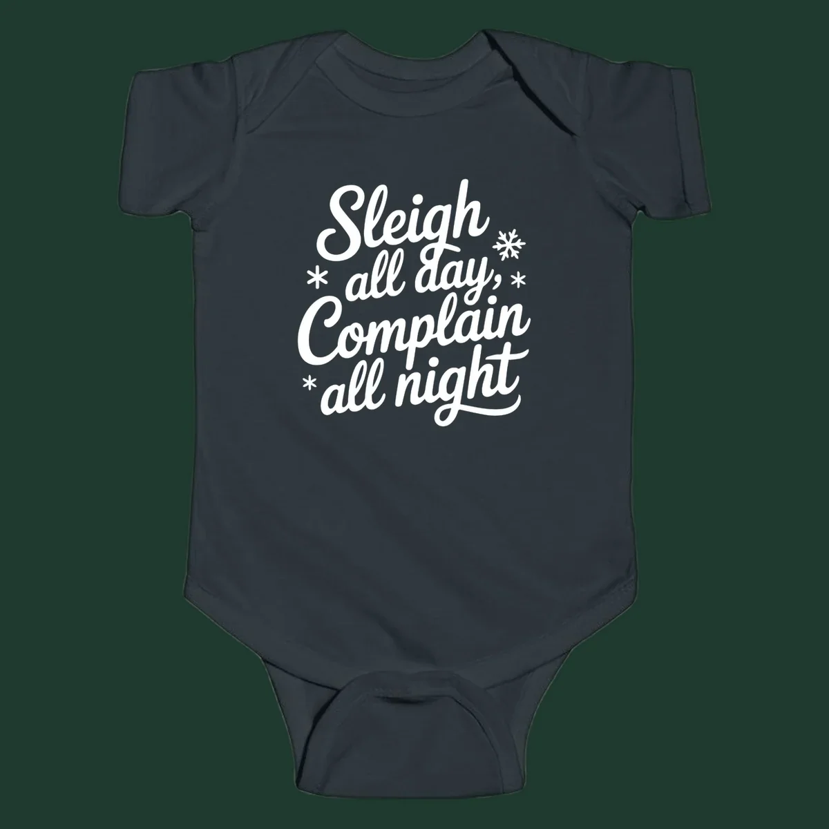 White typography reading 'Sleigh all day, Complain all night' with snowflakes and asterisks. sleigh-all-day.