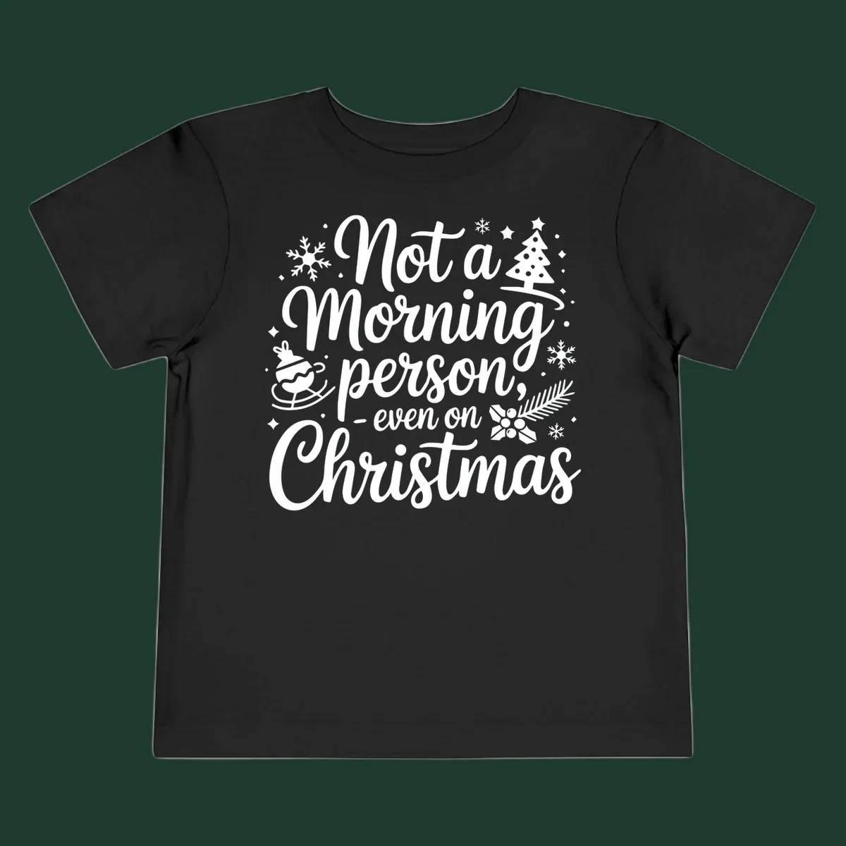 White typography on black background reads 'Not a Morning Person Christmas' with holiday graphics.