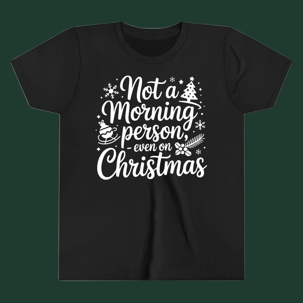 White typography on black background reads 'Not a Morning Person Christmas' with holiday graphics.