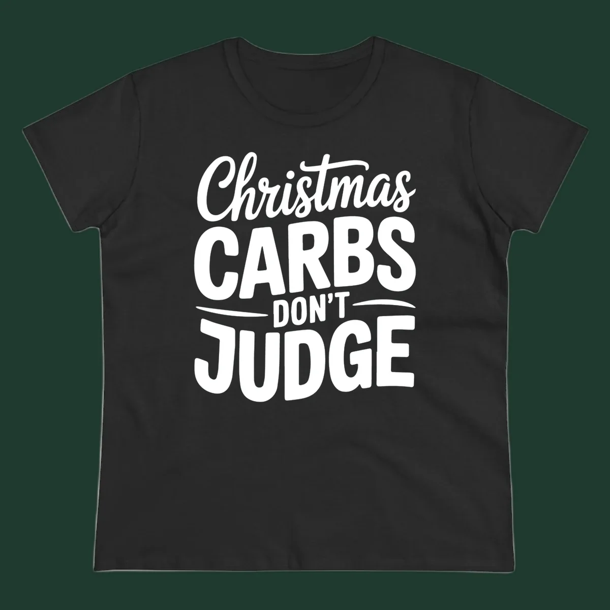 Christmas carbs don't judge phrase in white bold typography on black background.
