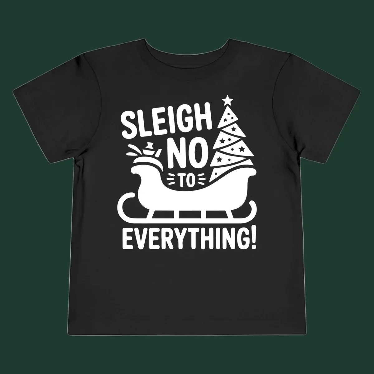 Sleigh no to everything graphic with christmas tree in sleigh.