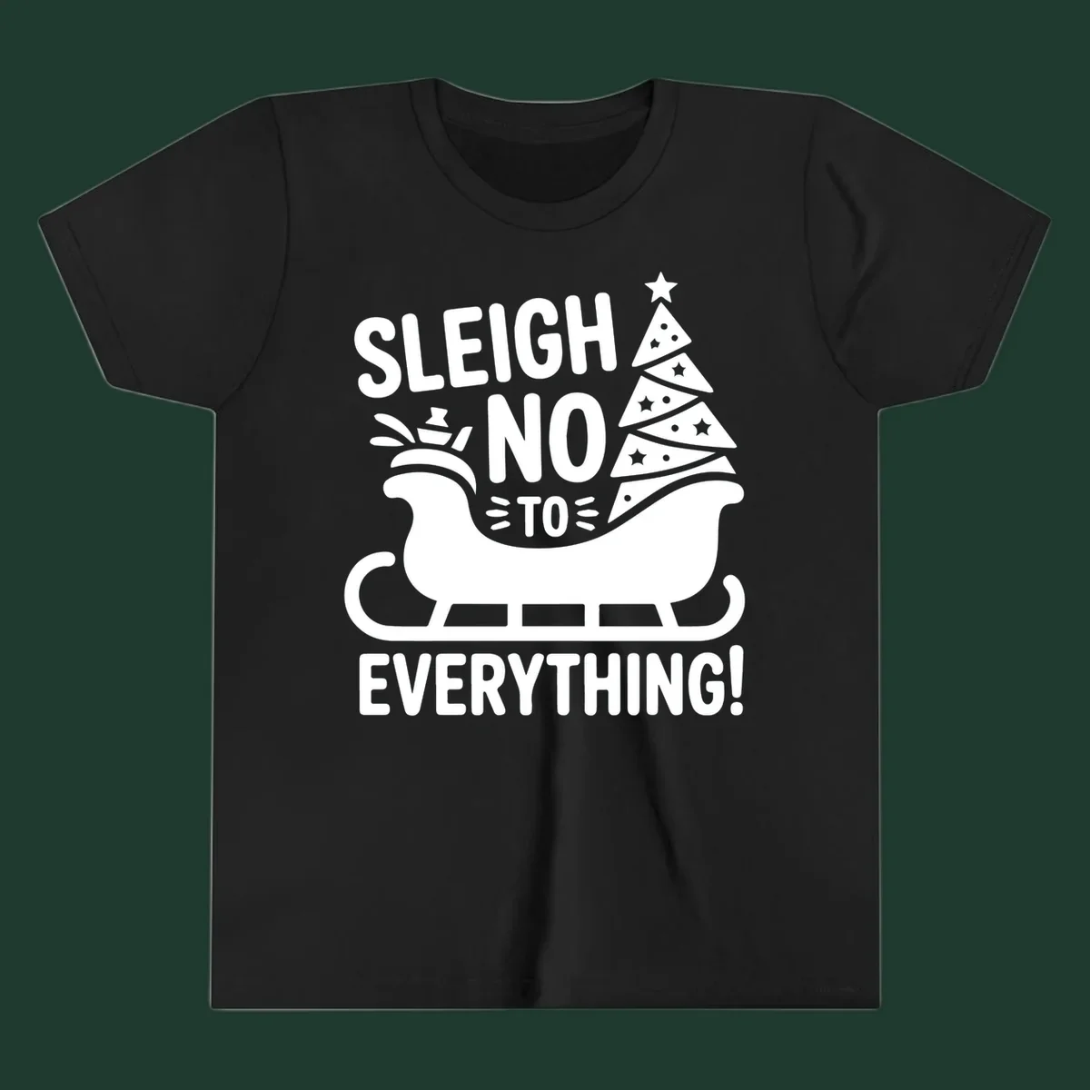 Sleigh no to everything graphic with christmas tree in sleigh.