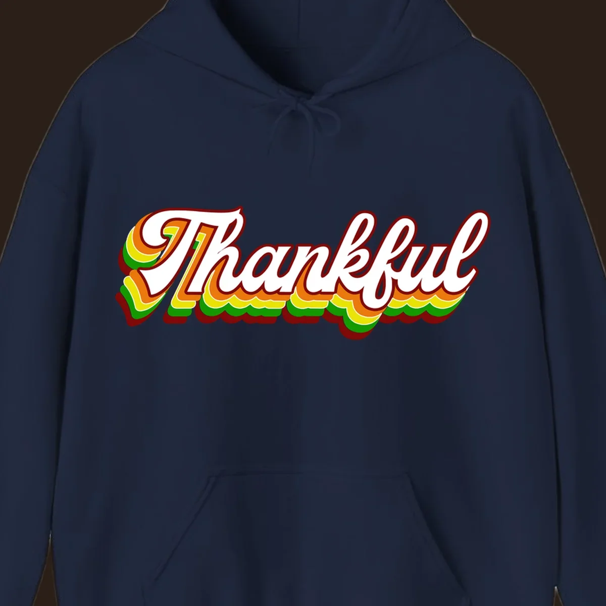Retro thankful script text in white with colorful layered outlines and dark red shadow.