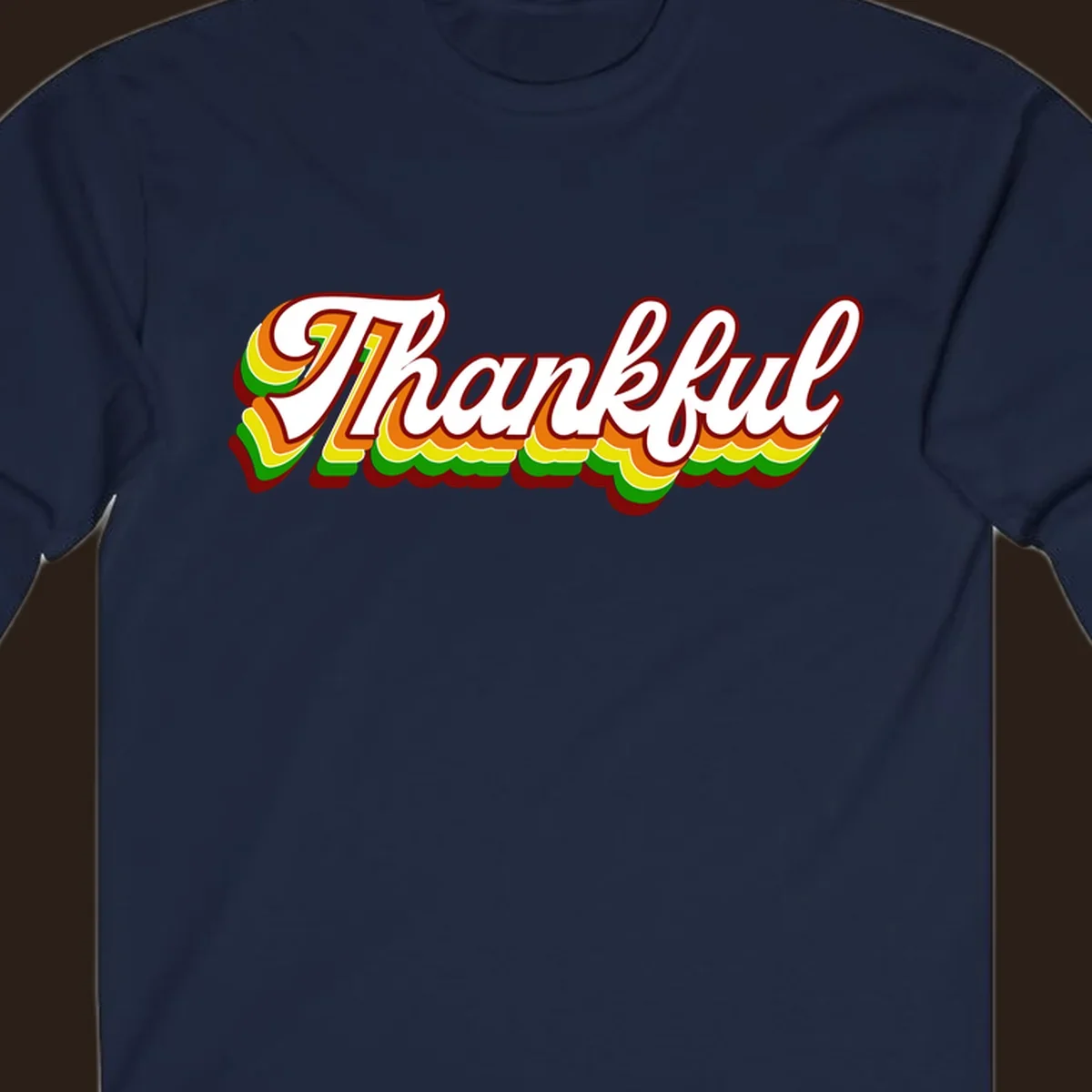 Retro thankful script text in white with colorful layered outlines and dark red shadow.