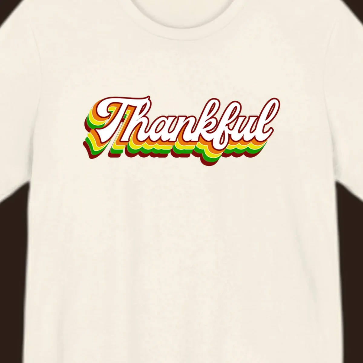Retro thankful script text in white with colorful layered outlines and dark red shadow.