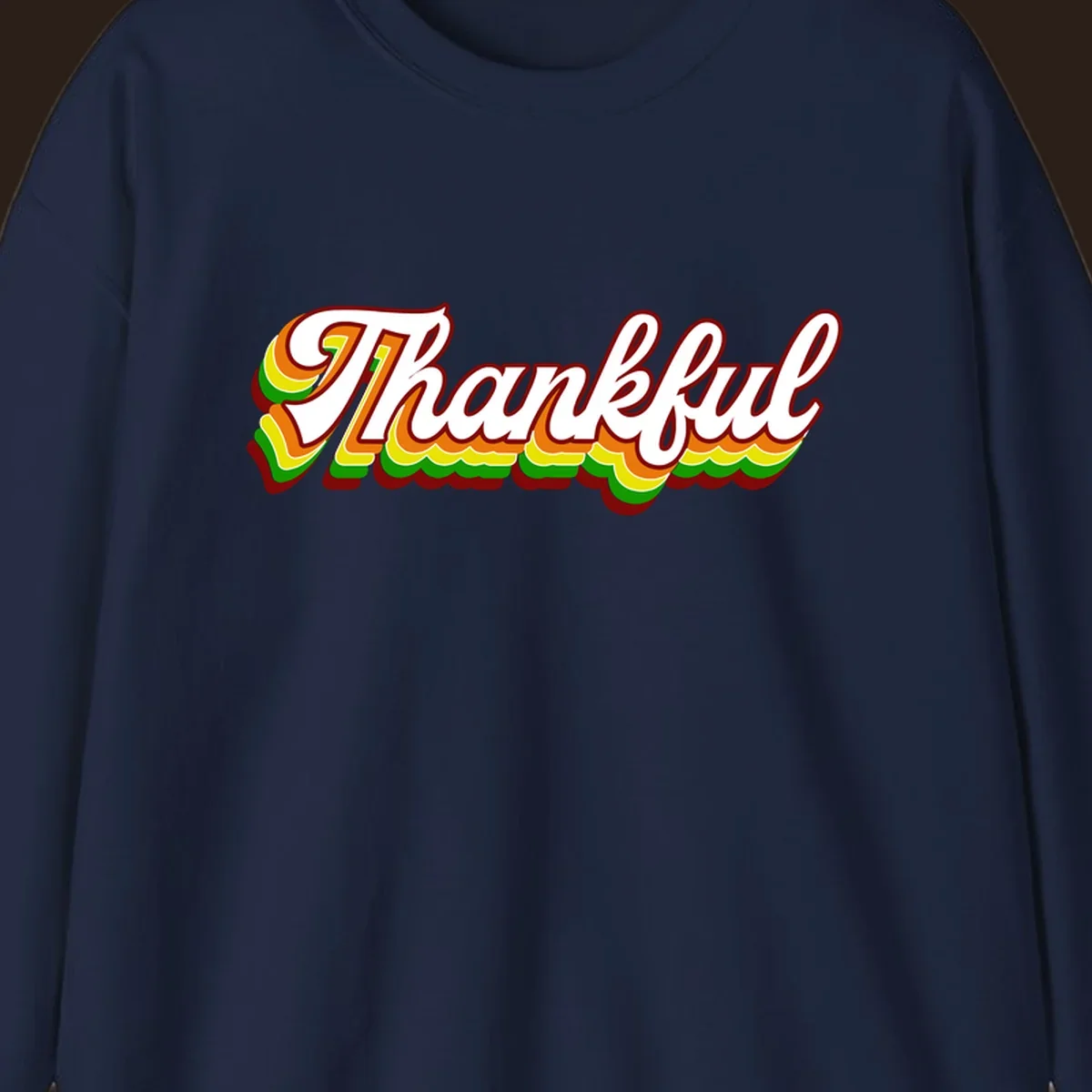 Retro thankful script text in white with colorful layered outlines and dark red shadow.
