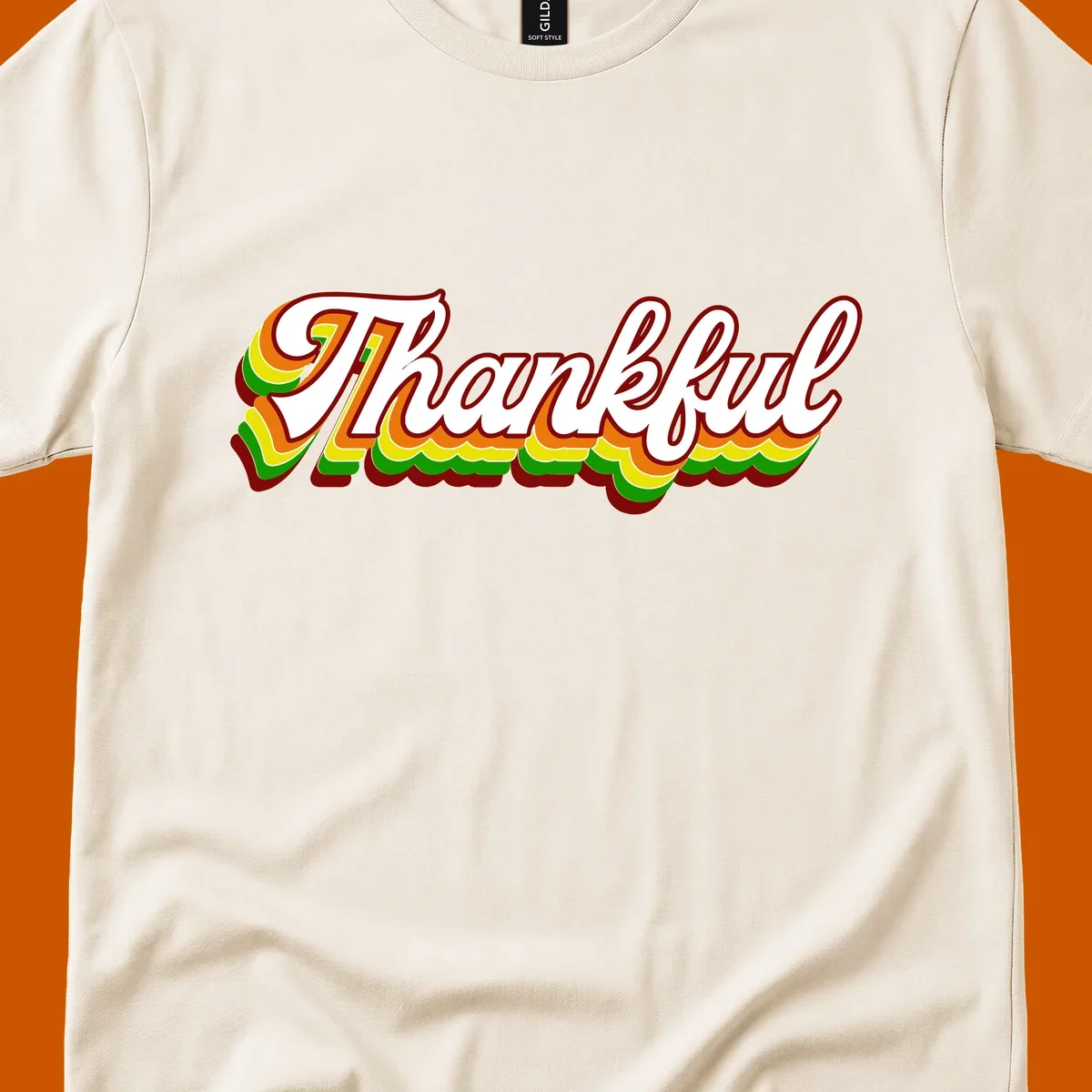 Retro thankful script text in white with colorful layered outlines and dark red shadow.
