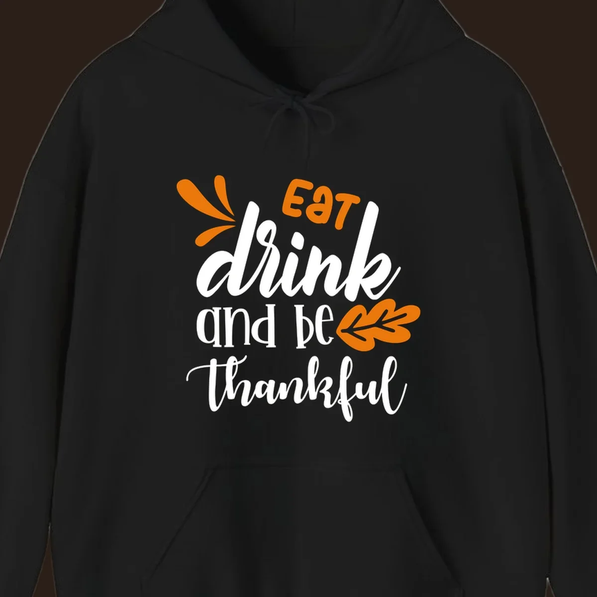 Eat Drink and Be Thankful Thanksgiving text and leaf graphic