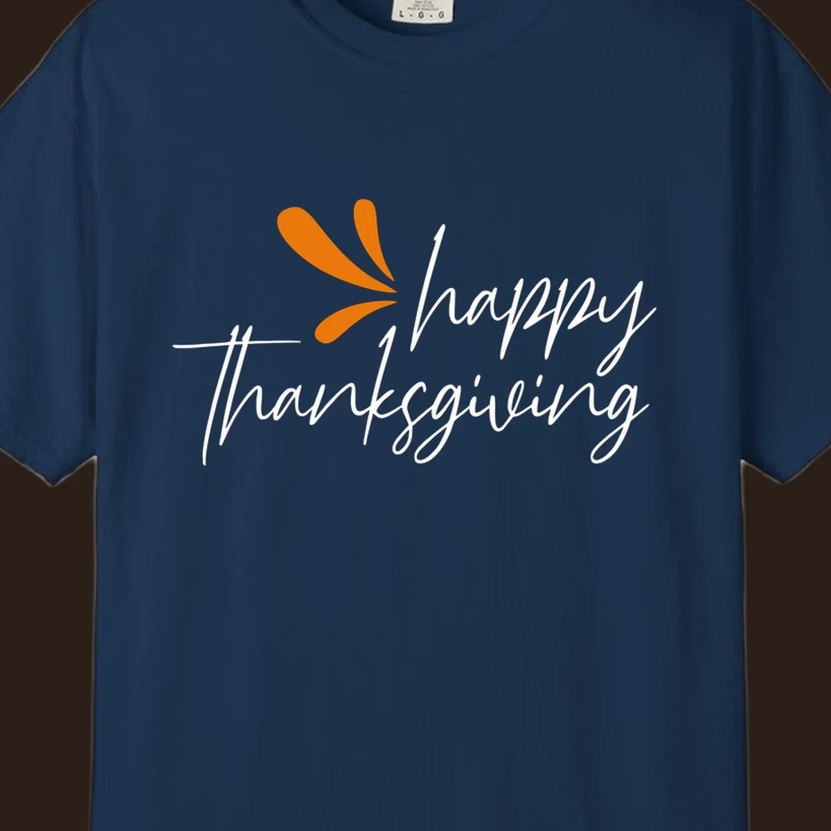 Happy Thanksgiving script text with an orange graphic element.