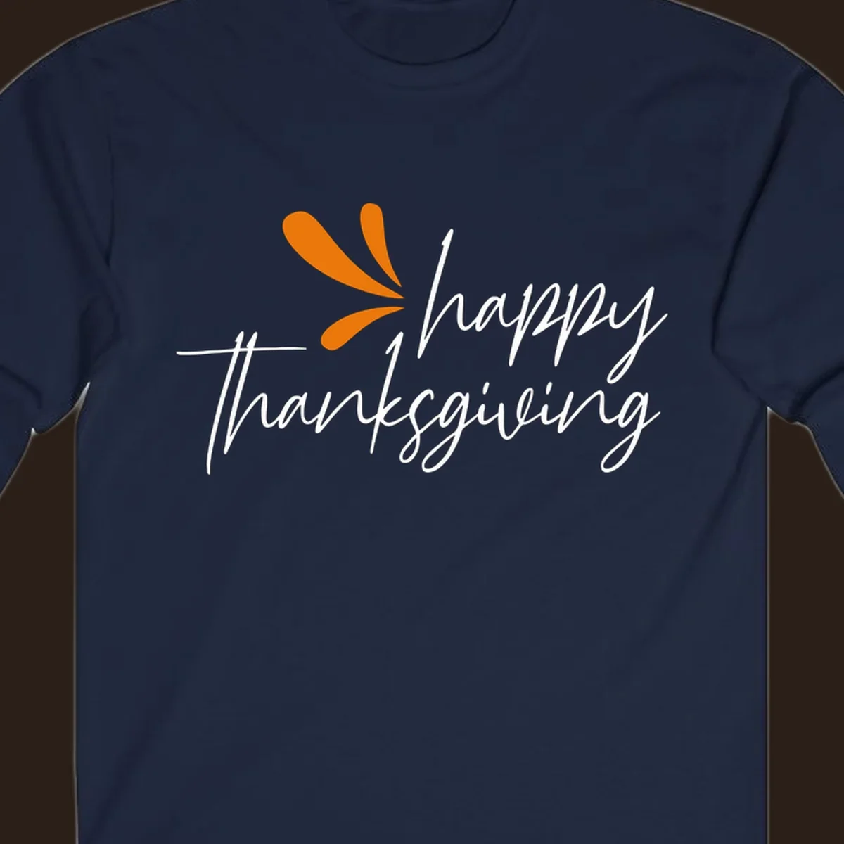 Happy Thanksgiving script text with an orange graphic element.