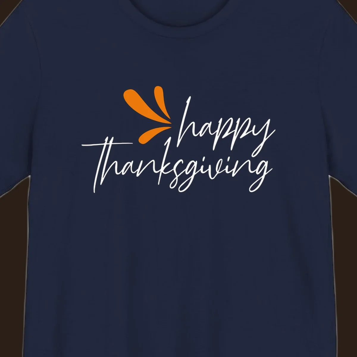 Happy Thanksgiving script text with an orange graphic element.