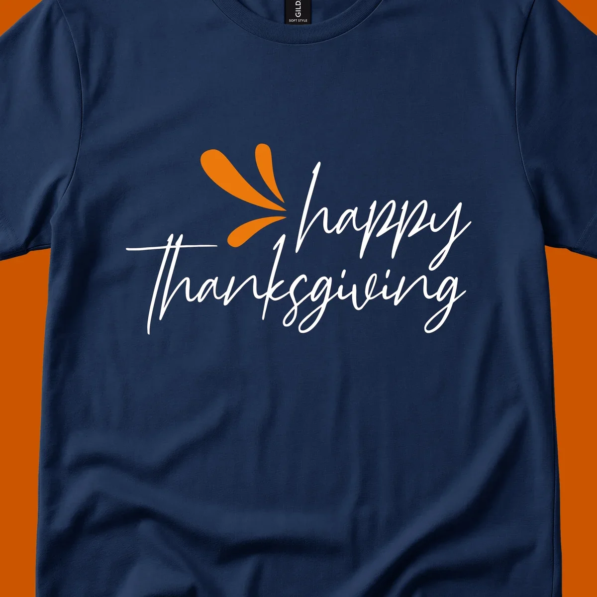 Happy Thanksgiving script text with an orange graphic element.