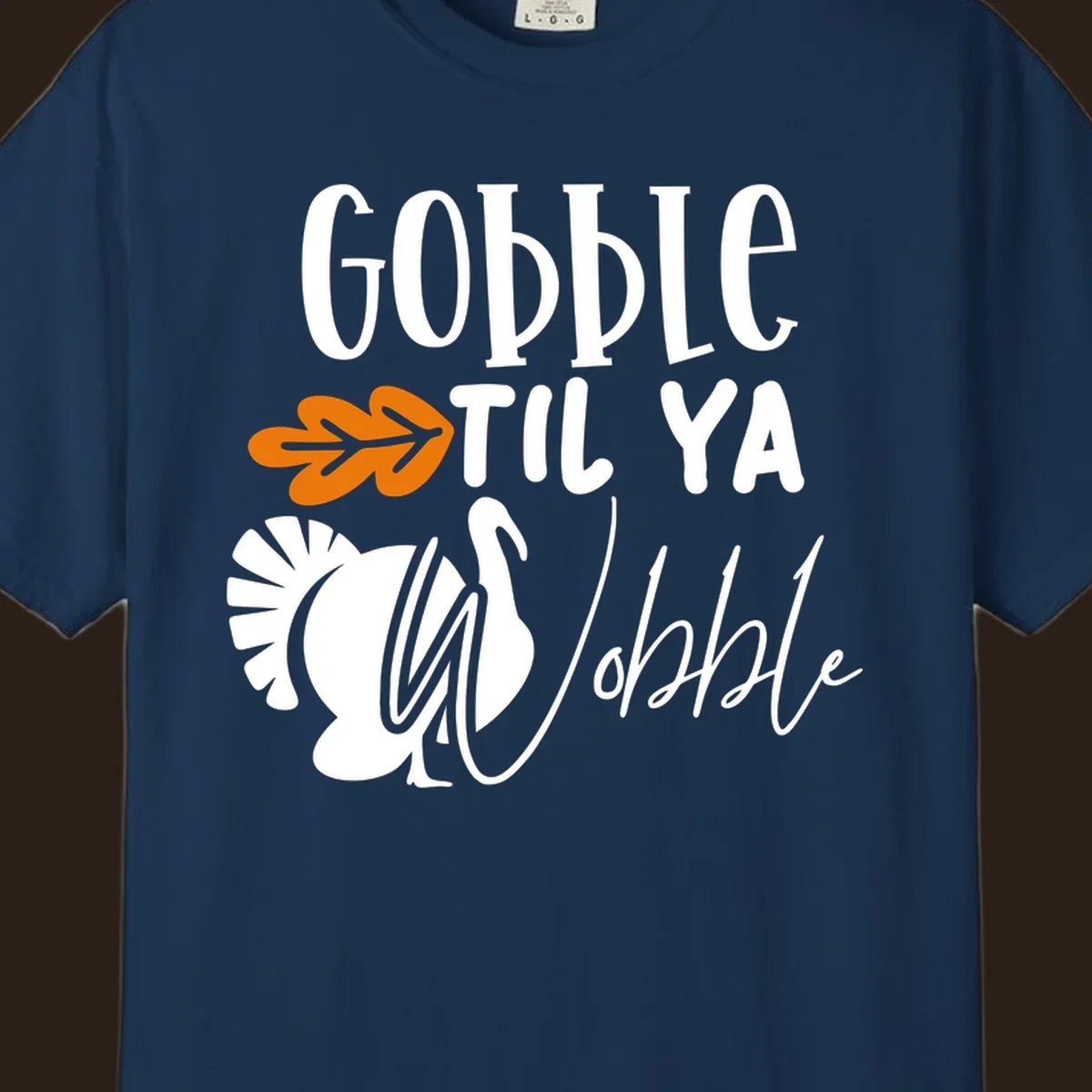Gobble til ya wobble turkey and fall leaf Thanksgiving graphic.
