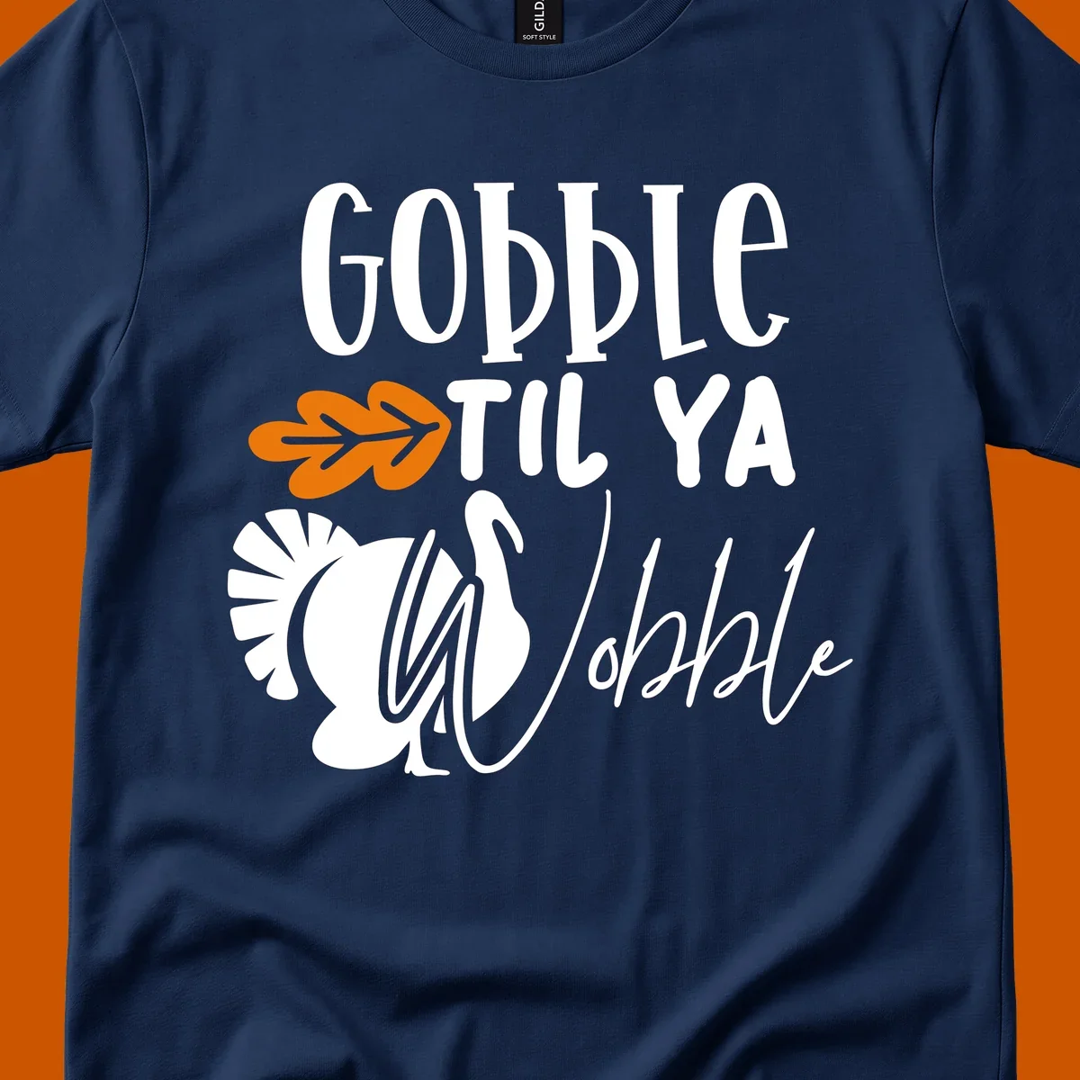Gobble til ya wobble turkey and fall leaf Thanksgiving graphic.