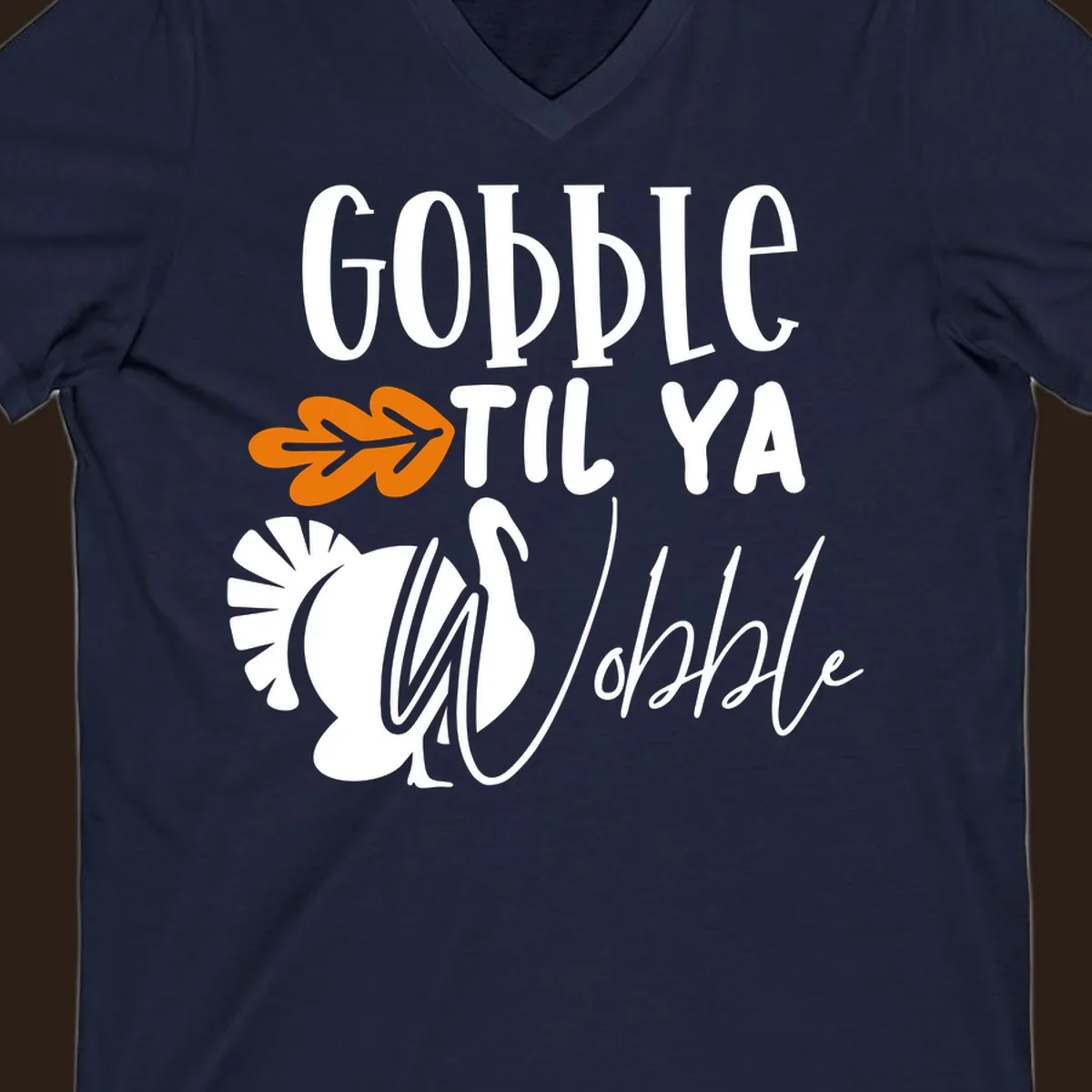 Gobble til ya wobble turkey and fall leaf Thanksgiving graphic.