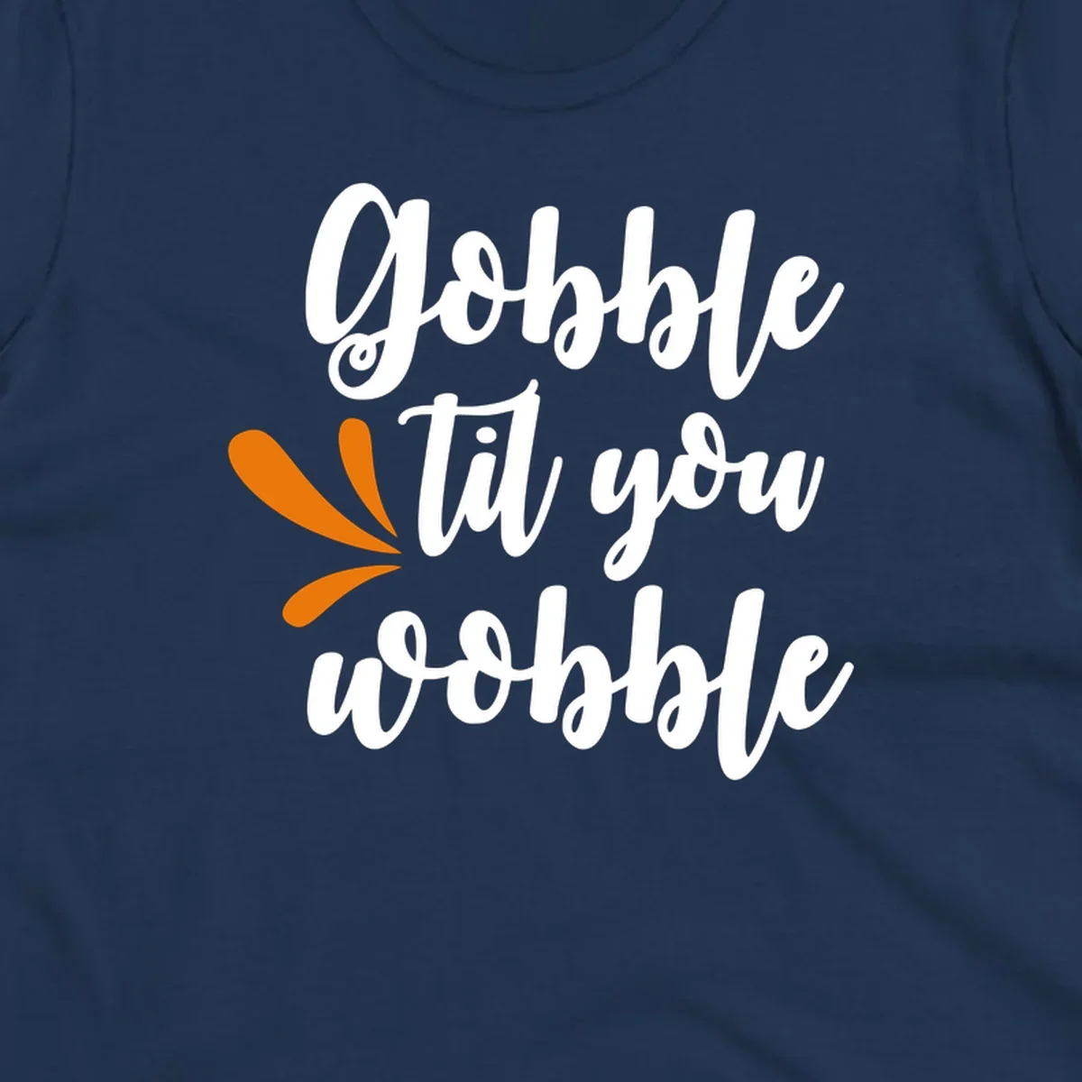Gobble 'til you wobble Thanksgiving phrase with orange turkey feather illustrations.