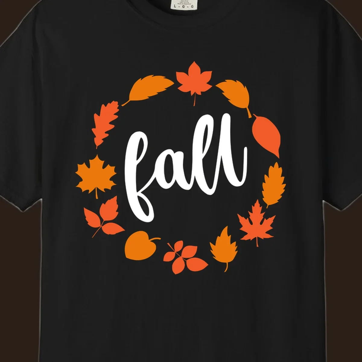 Fall leaves wreath with white script text.